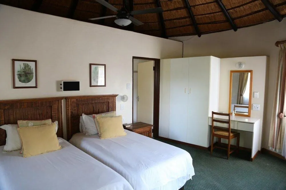 Photo of the whole room, Bed in The Nest Drakensberg Mountain Resort Hotel