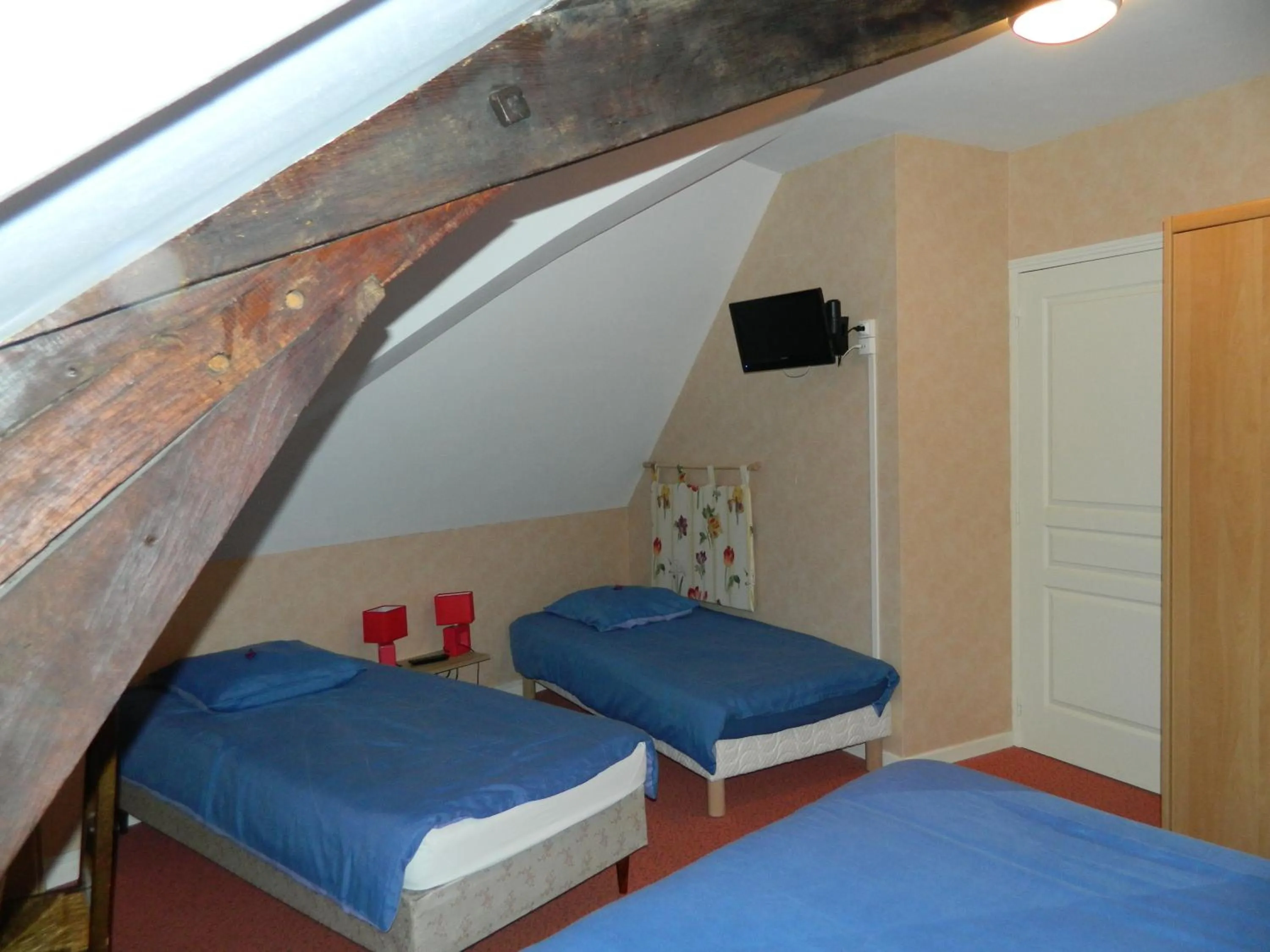Bedroom in Le Lion D'or