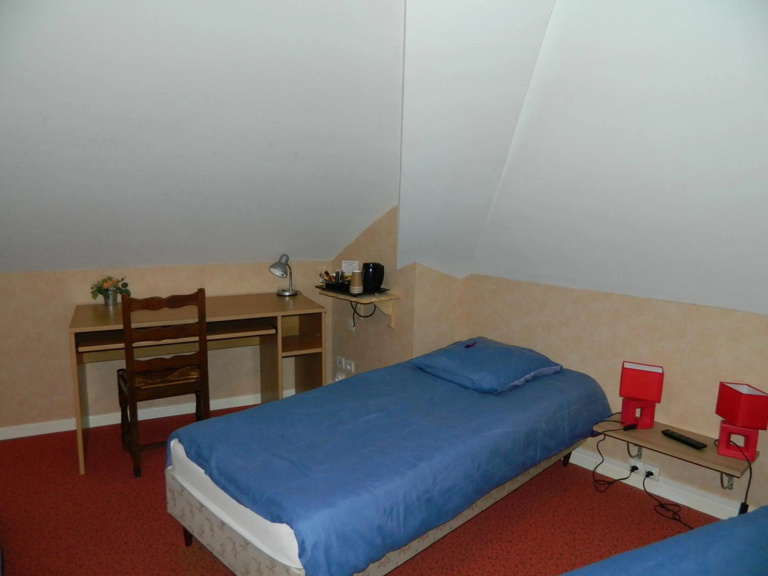 Bedroom in Le Lion D'or