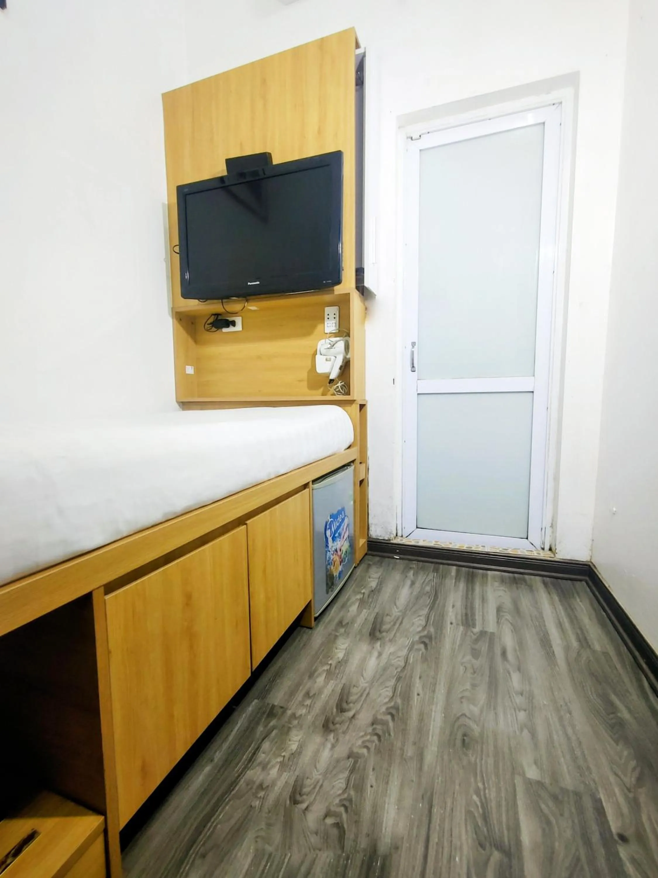 Bedroom in ABC Hotel