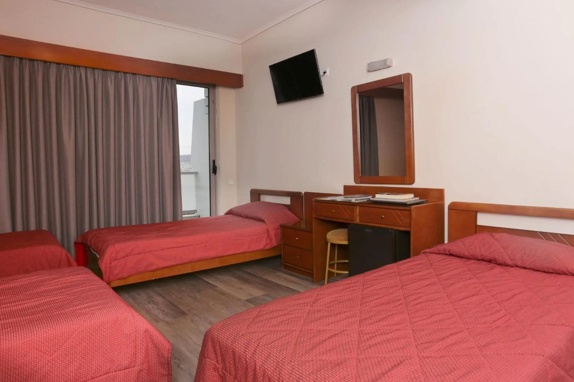 Bed in Xenophon Hotel