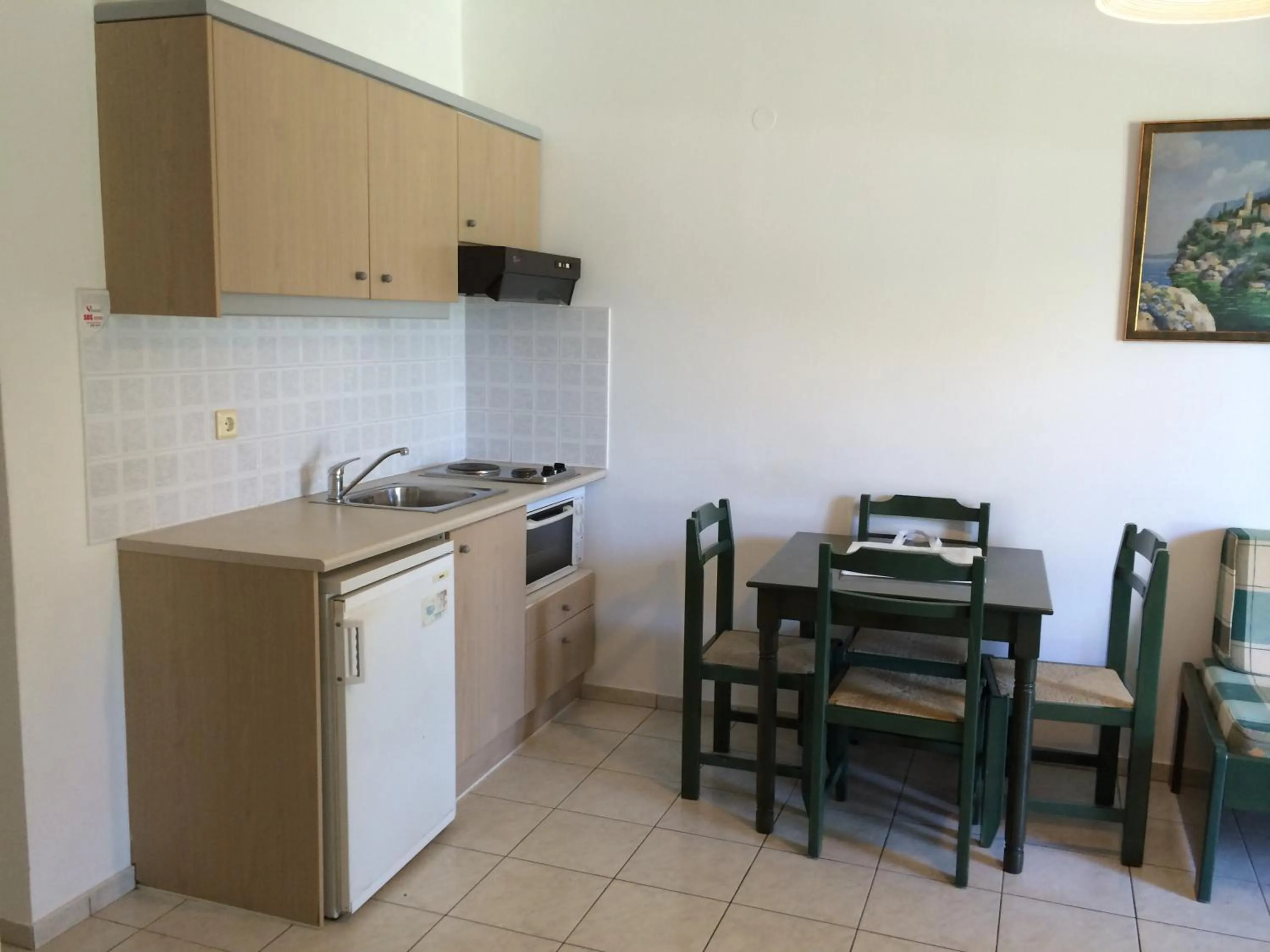 Kitchen or kitchenette in Nikolas Villas Appartments