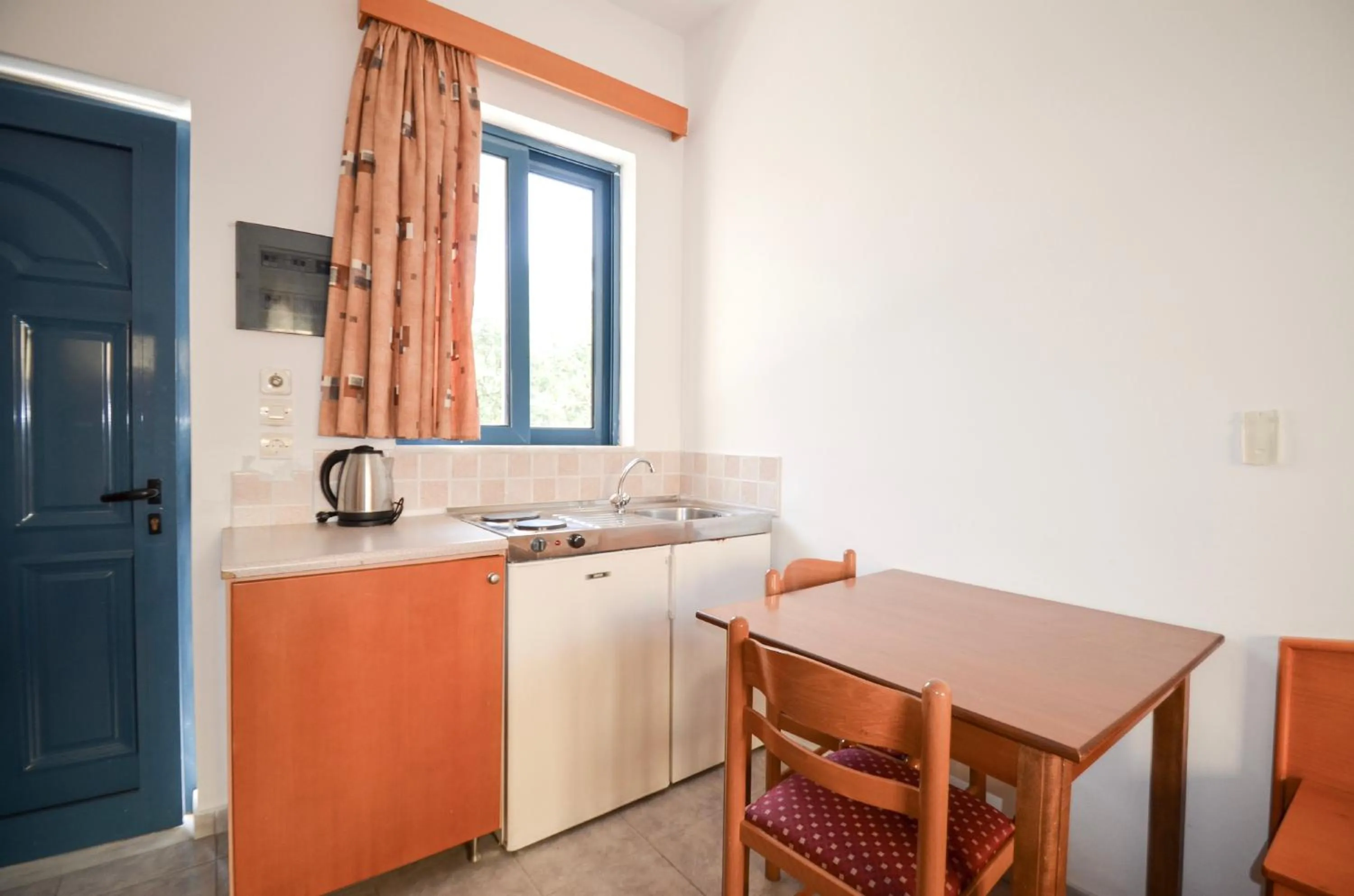 Kitchen or kitchenette in Stegna Star Apartments