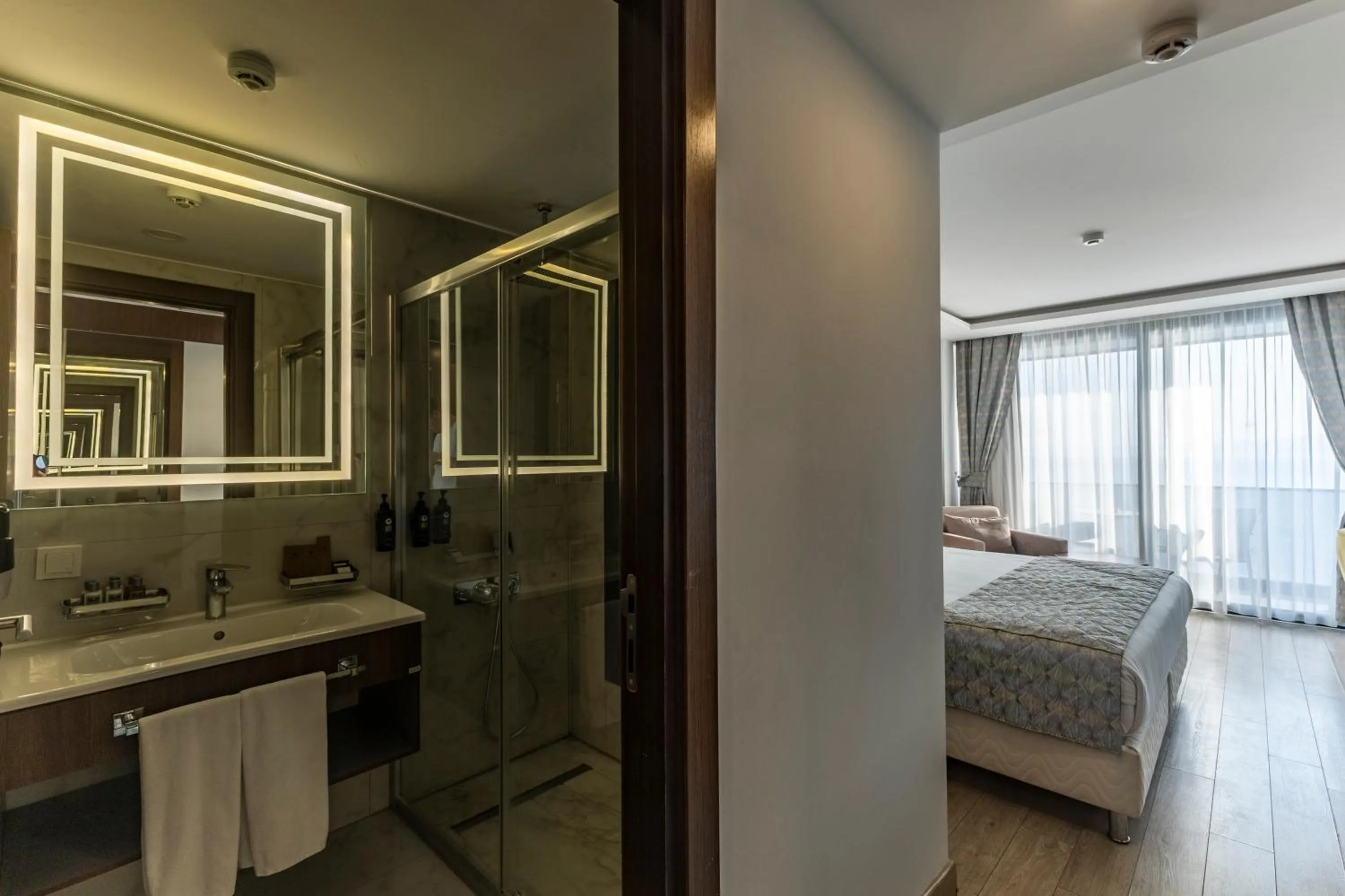 Shower, Bed in The Nowness Luxury Hotel & Spa Adulty Only