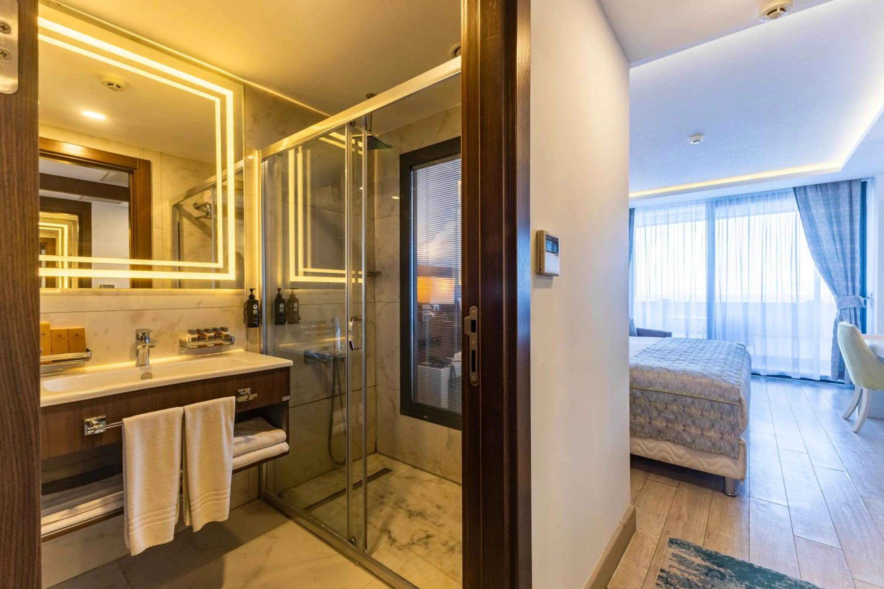 Photo of the whole room, Bed in The Nowness Luxury Hotel & Spa Adulty Only