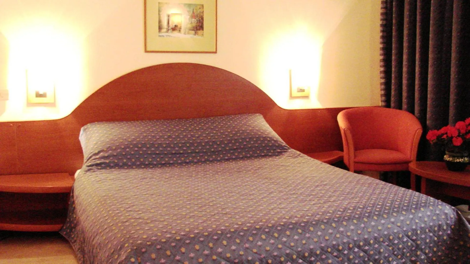 Bed in Hotel Irisa
