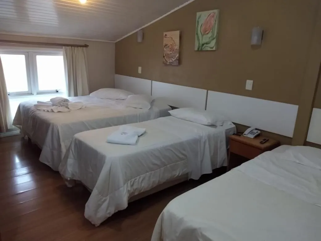 Standard Quadruple Room - single occupancy in Pousada Ruppenthal