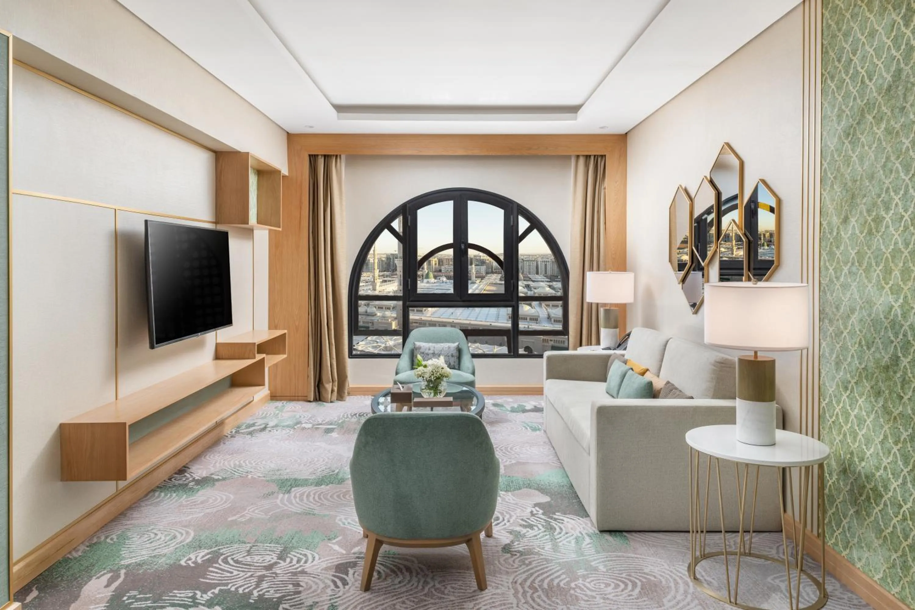 Communal lounge/ TV room in Taiba Suites Madinah