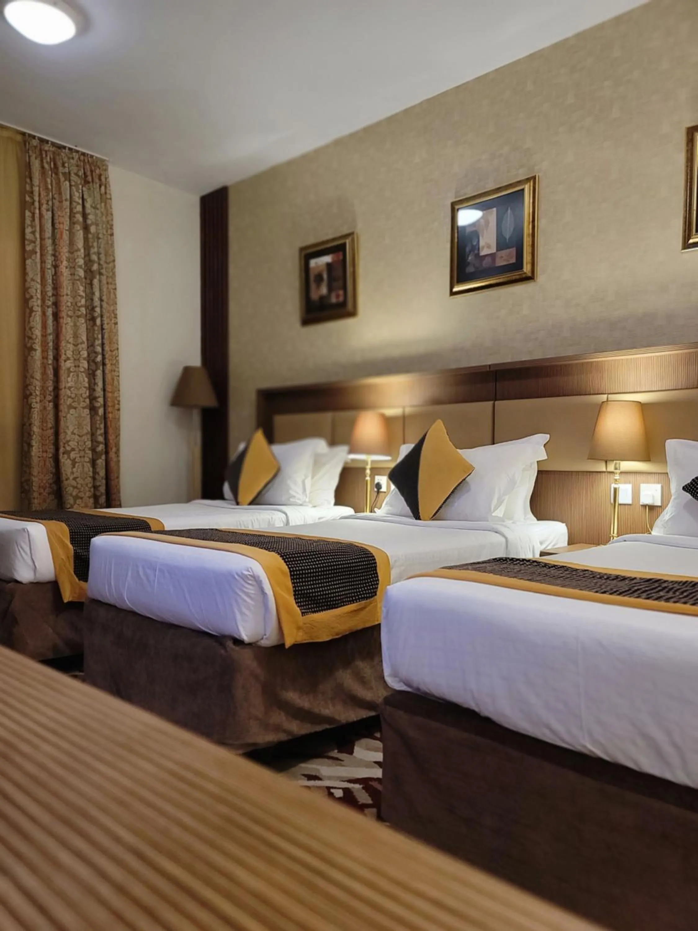 Bed in Al Ansar Palace Golden Tulip Hotel