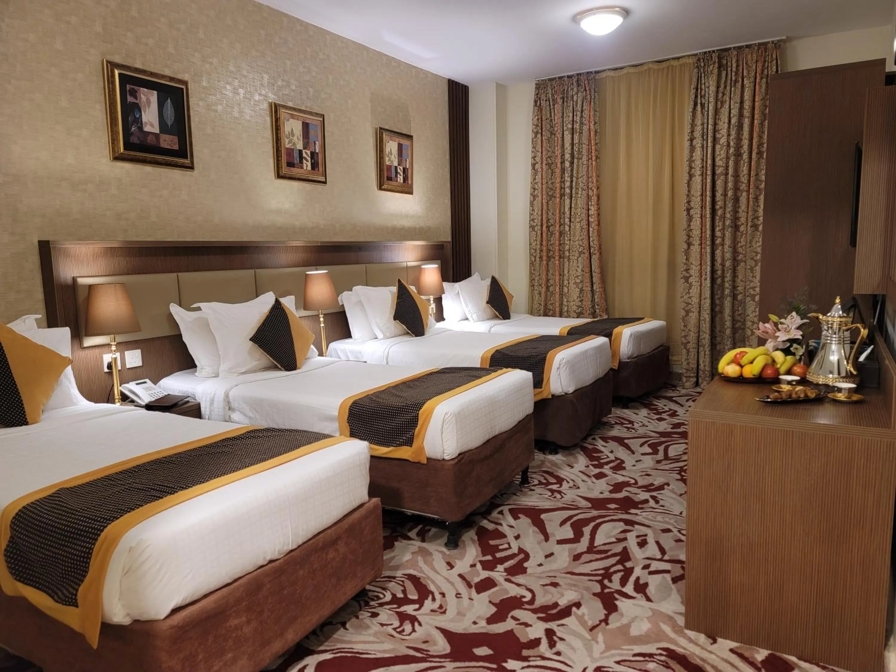 Bed in Al Ansar Palace Golden Tulip Hotel