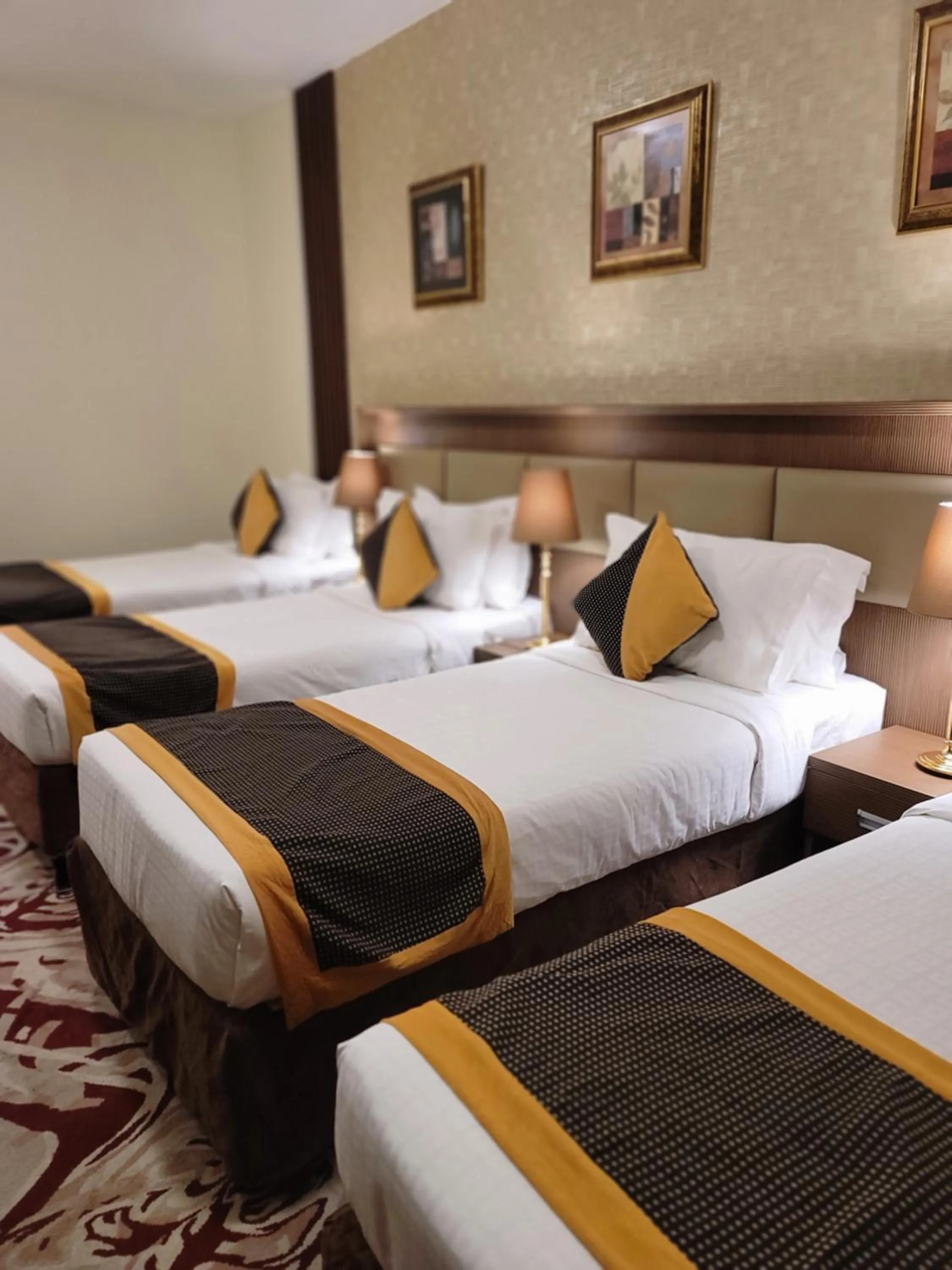 Bed in Al Ansar Palace Golden Tulip Hotel