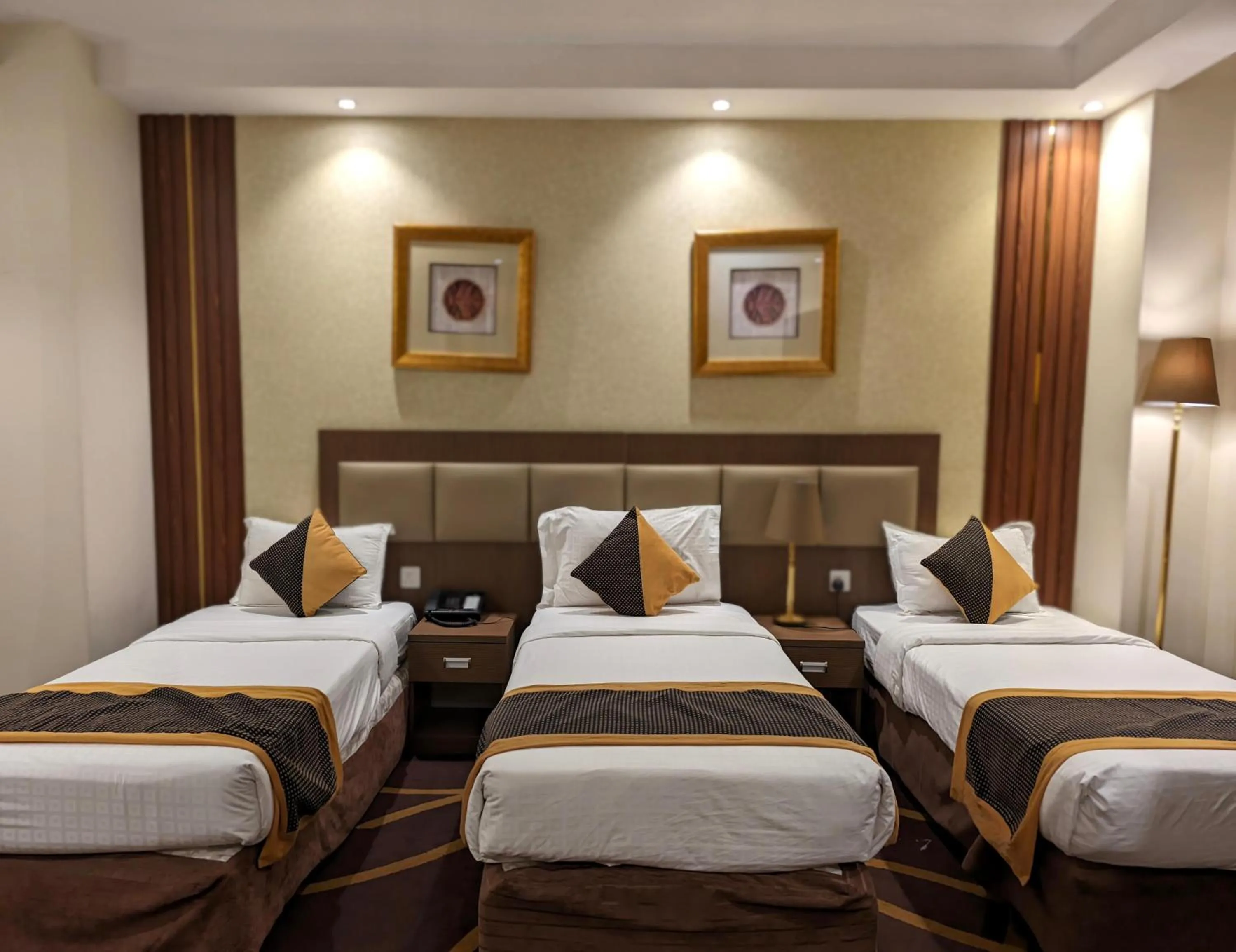 Bedroom, Bed in Al Ansar Palace Golden Tulip Hotel