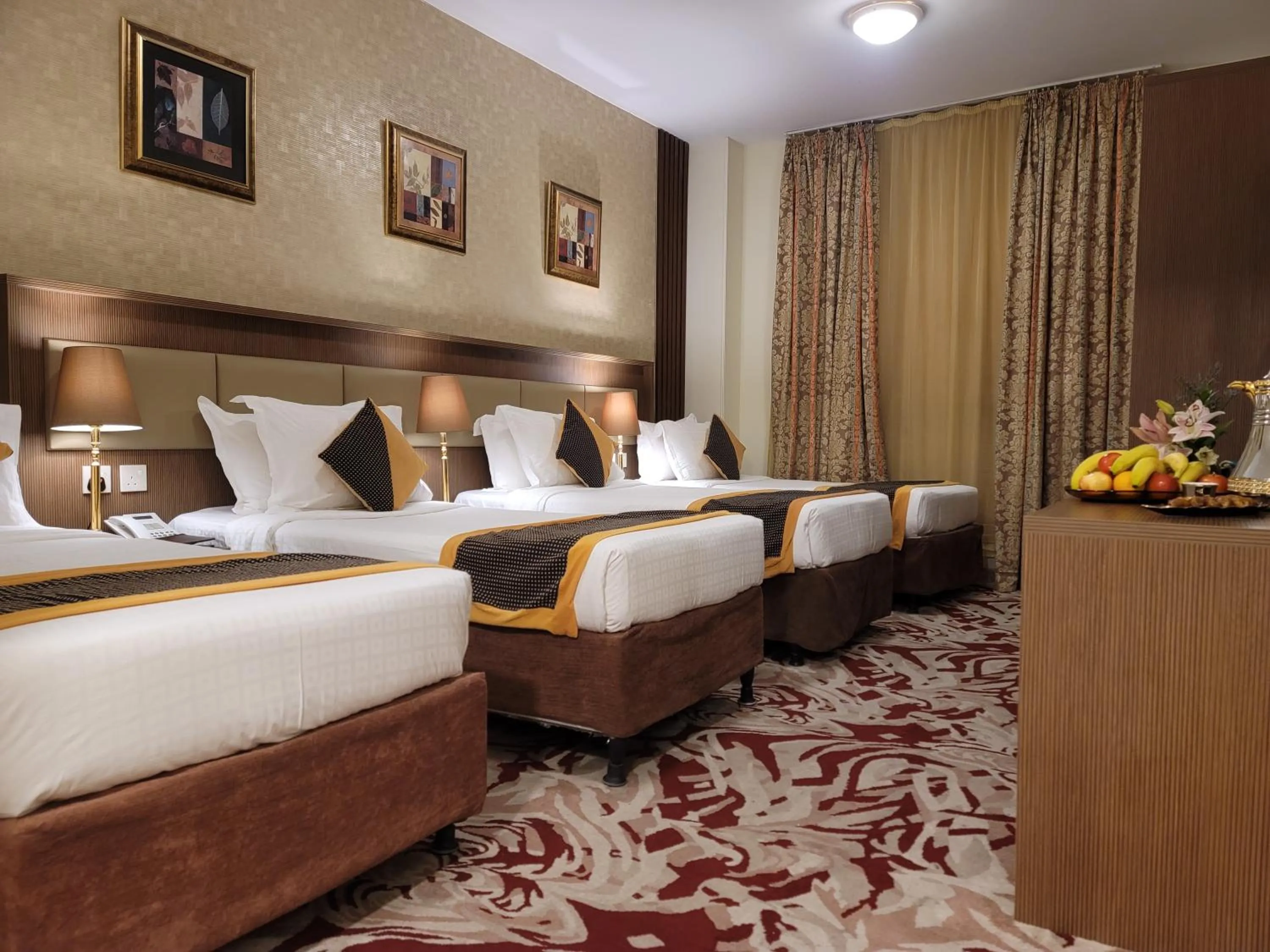 Bed in Al Ansar Palace Golden Tulip Hotel