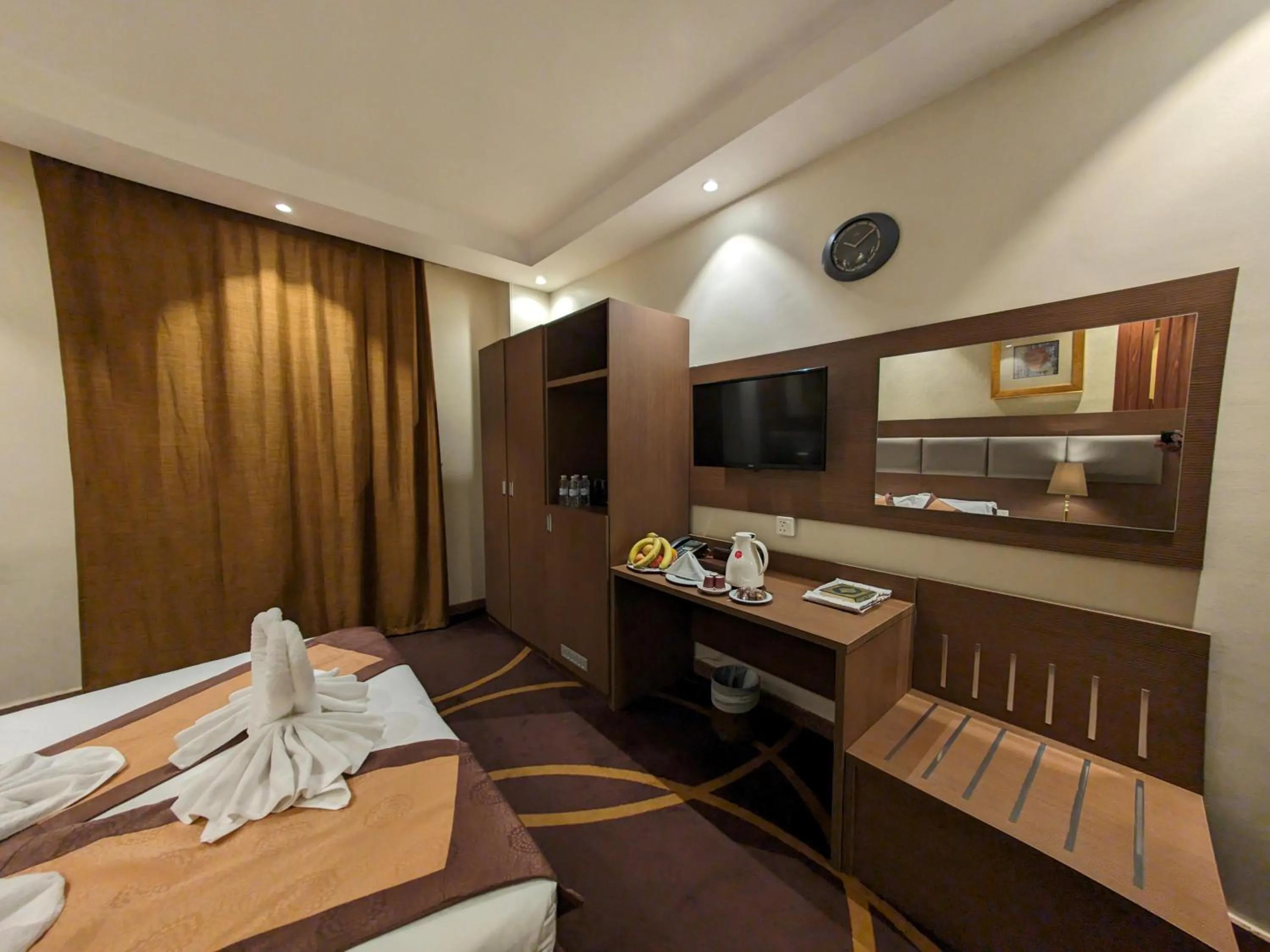 Bed in Al Ansar Palace Golden Tulip Hotel