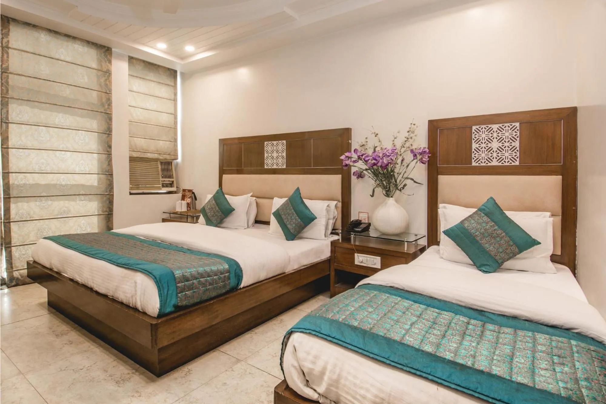 Bed in Hotel Sita International