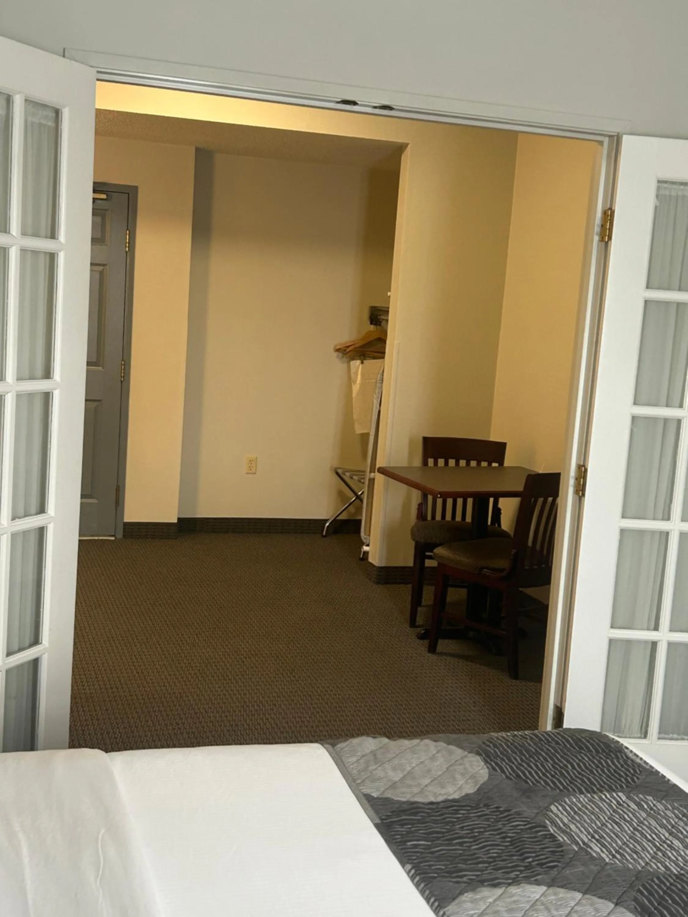 Bed in GrandStay Hotel & Suites Hastings