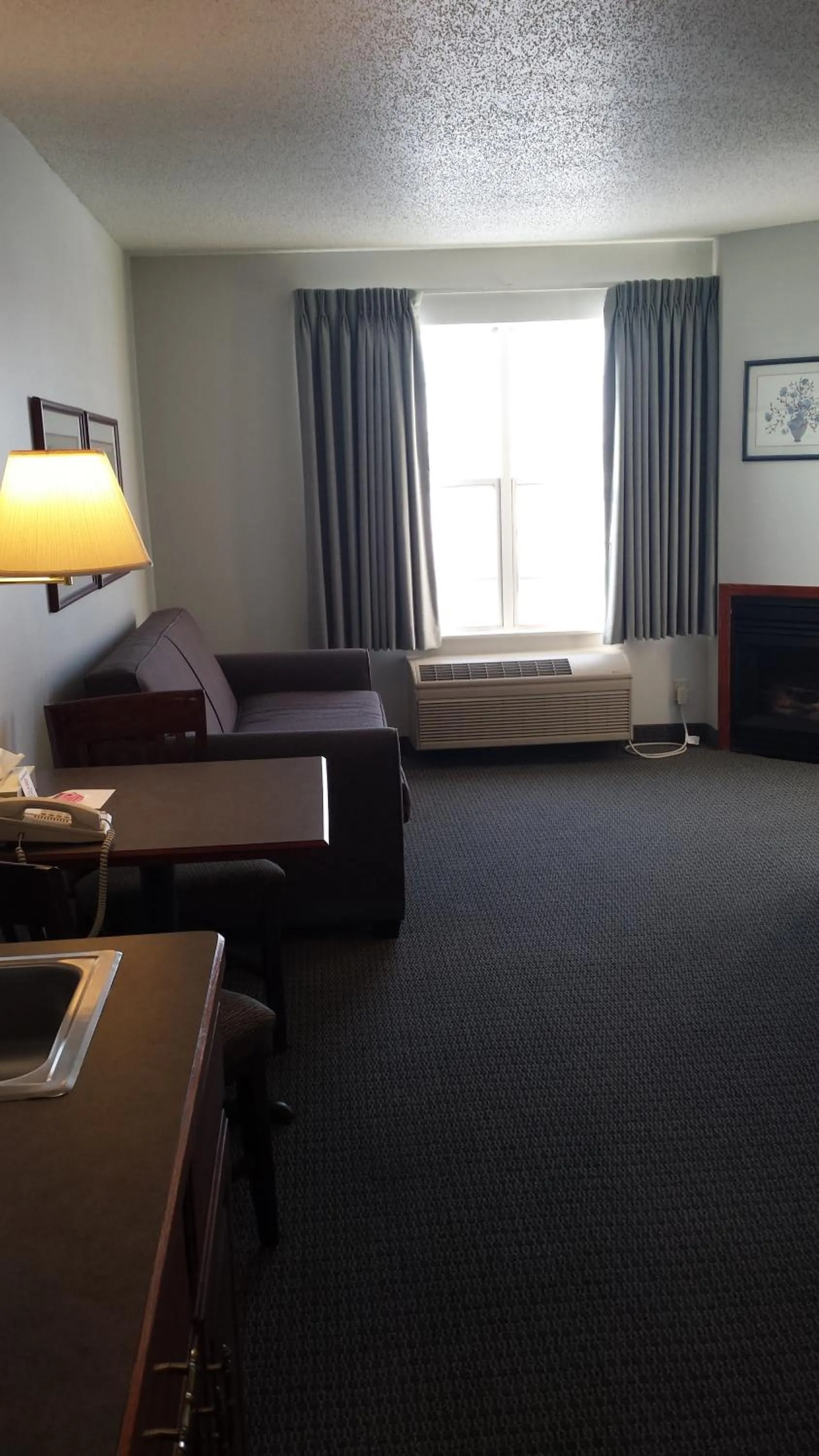 Bed in GrandStay Hotel & Suites Hastings