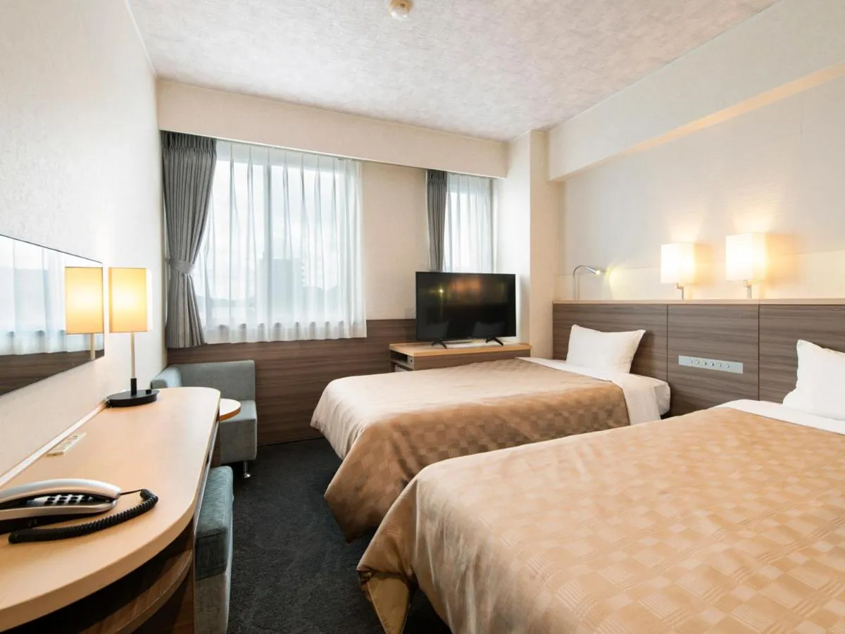 Bed in Onomichi Daiichi Hotel