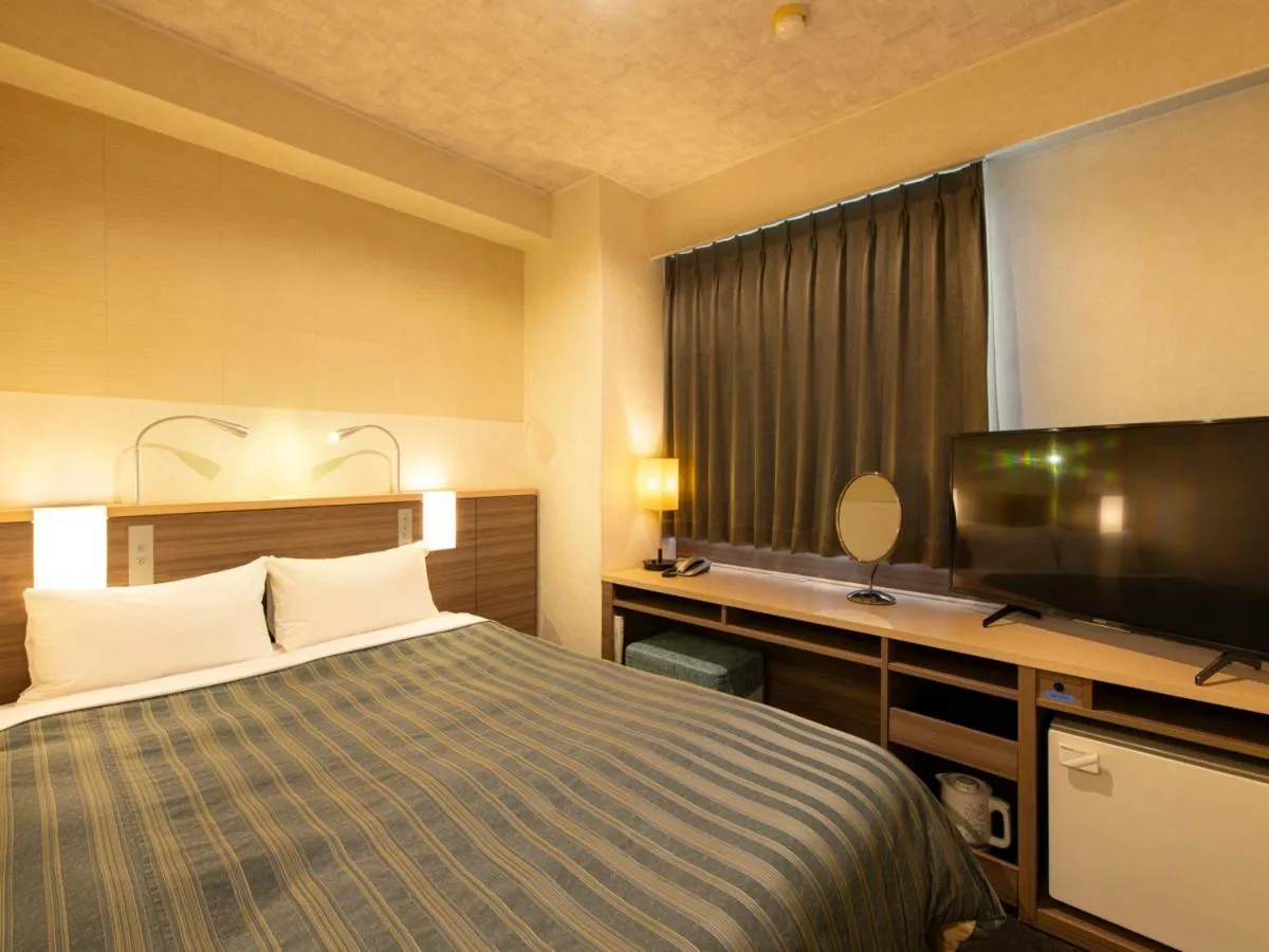 Bed in Onomichi Daiichi Hotel