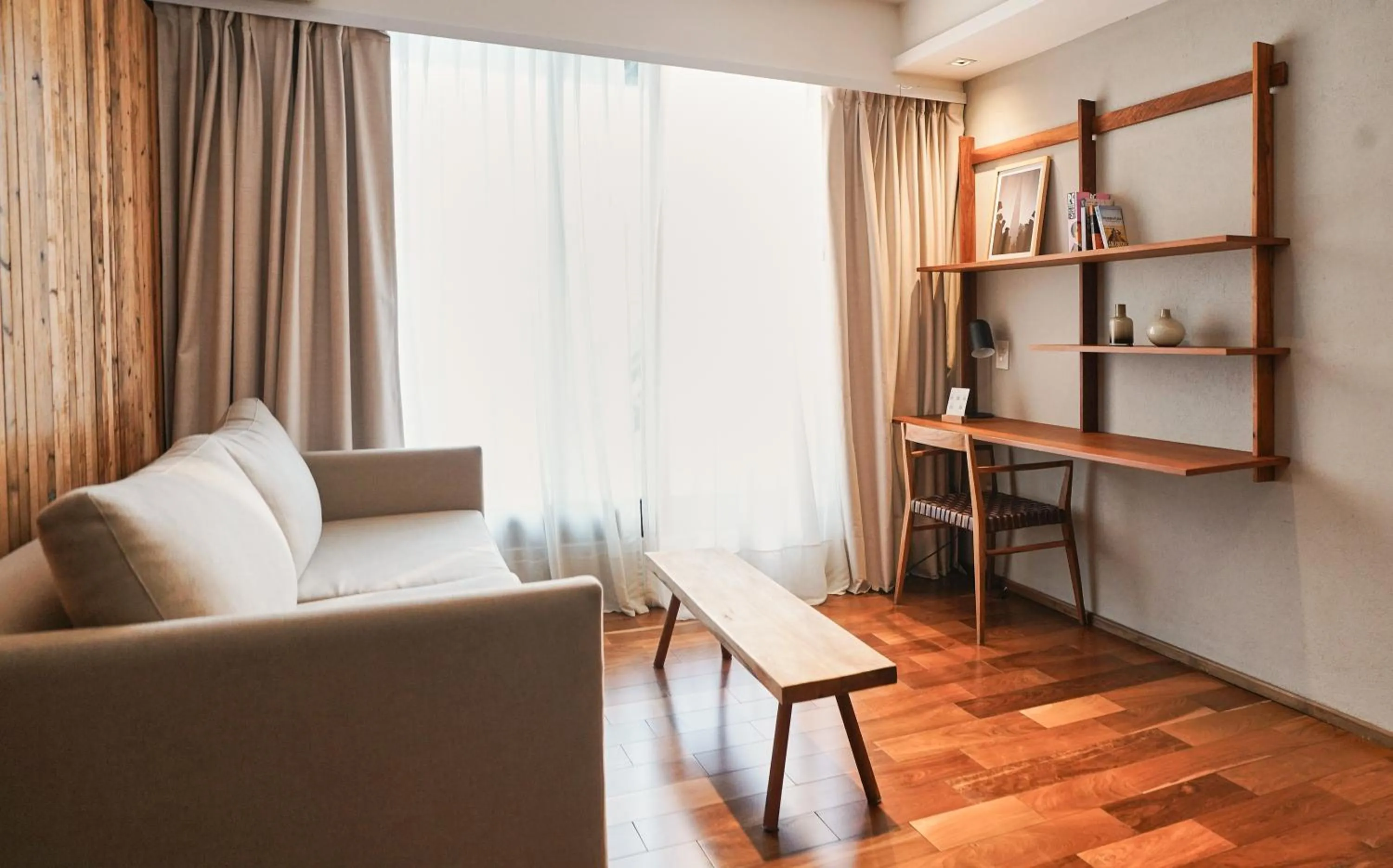 Living room in AQ Tailored Suites