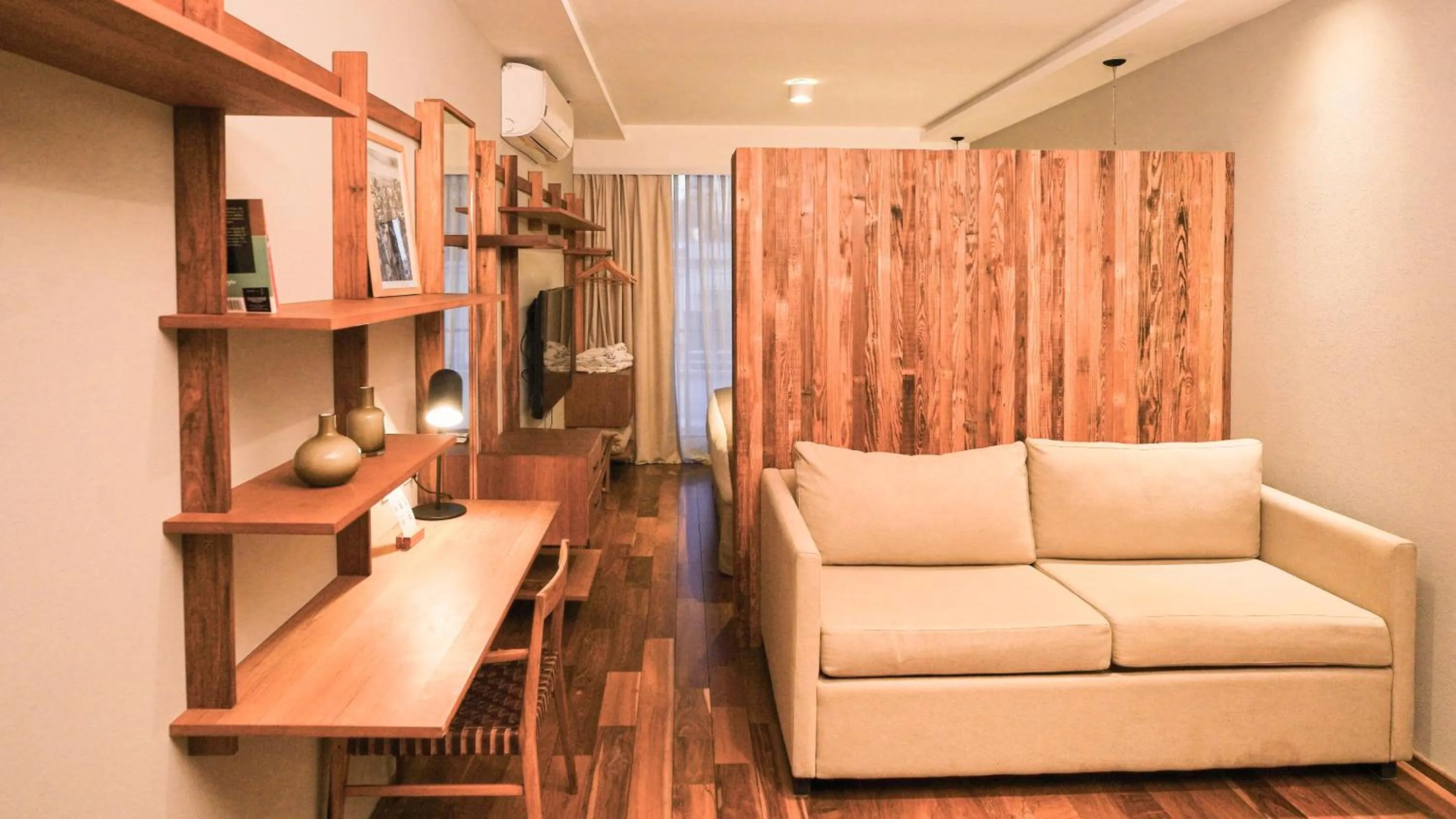 Bedroom in AQ Tailored Suites