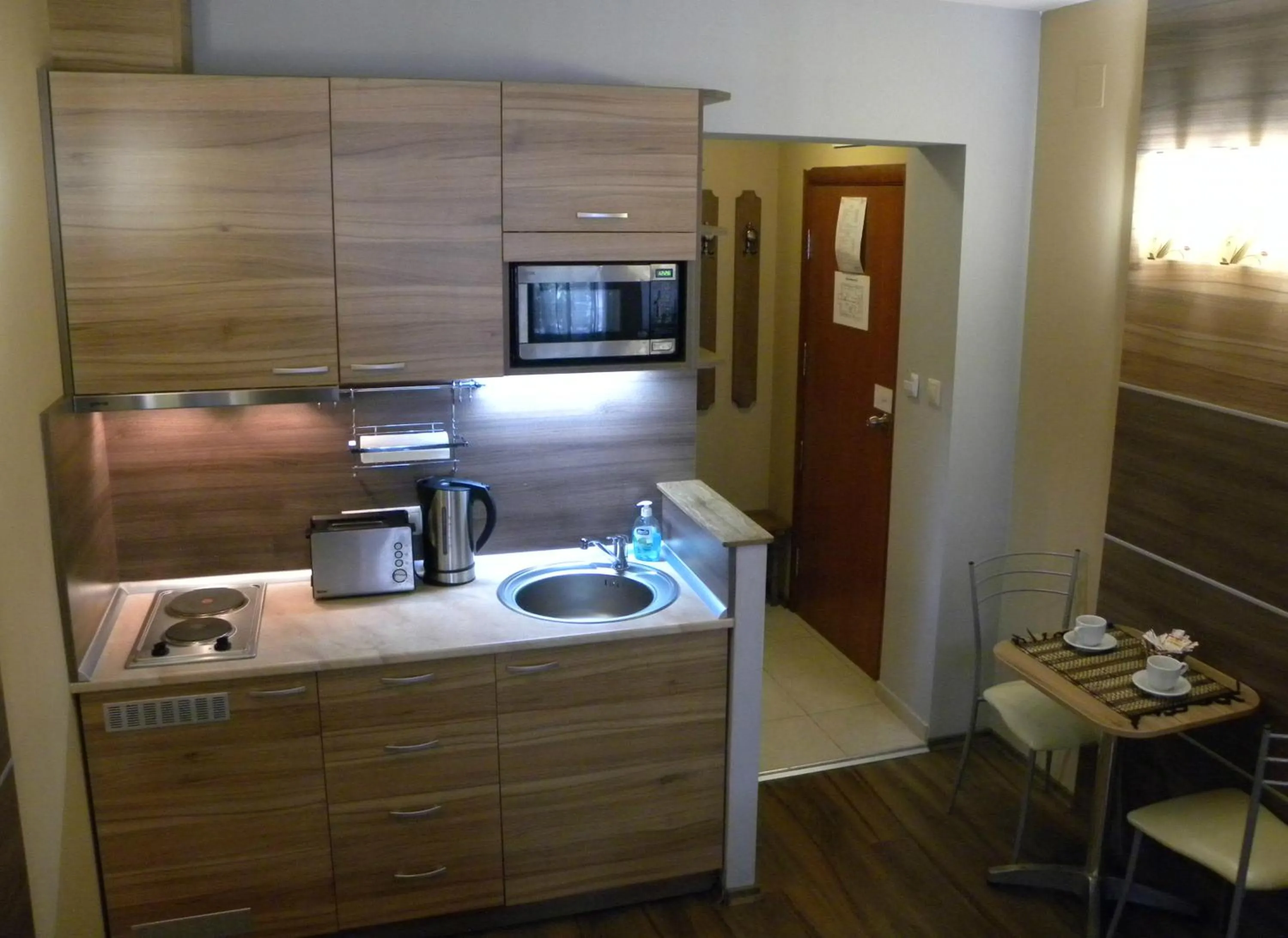 Coffee/tea facilities in Three Dolphins Hotel with a Rooftop terracе