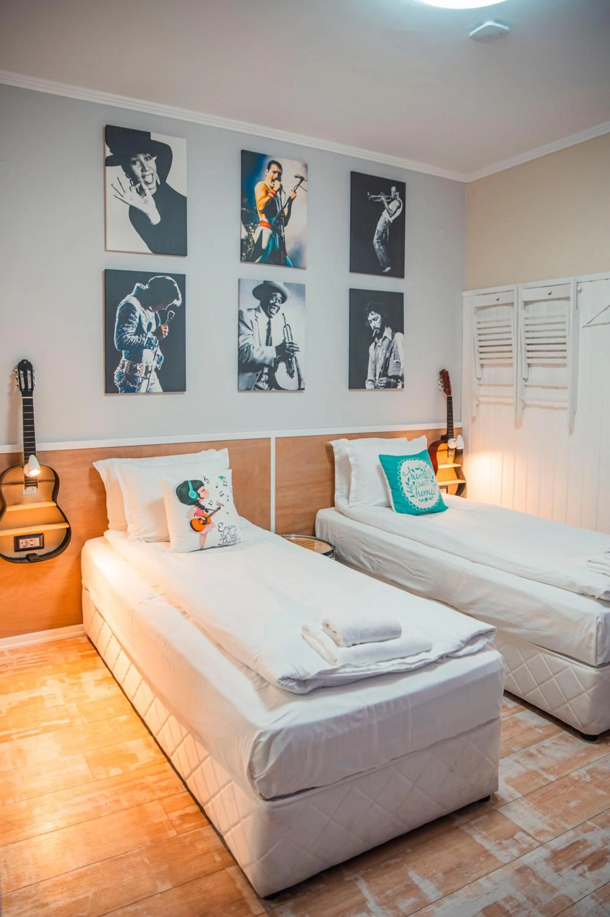 Bed in Three Dolphins Hotel with a Rooftop terracе