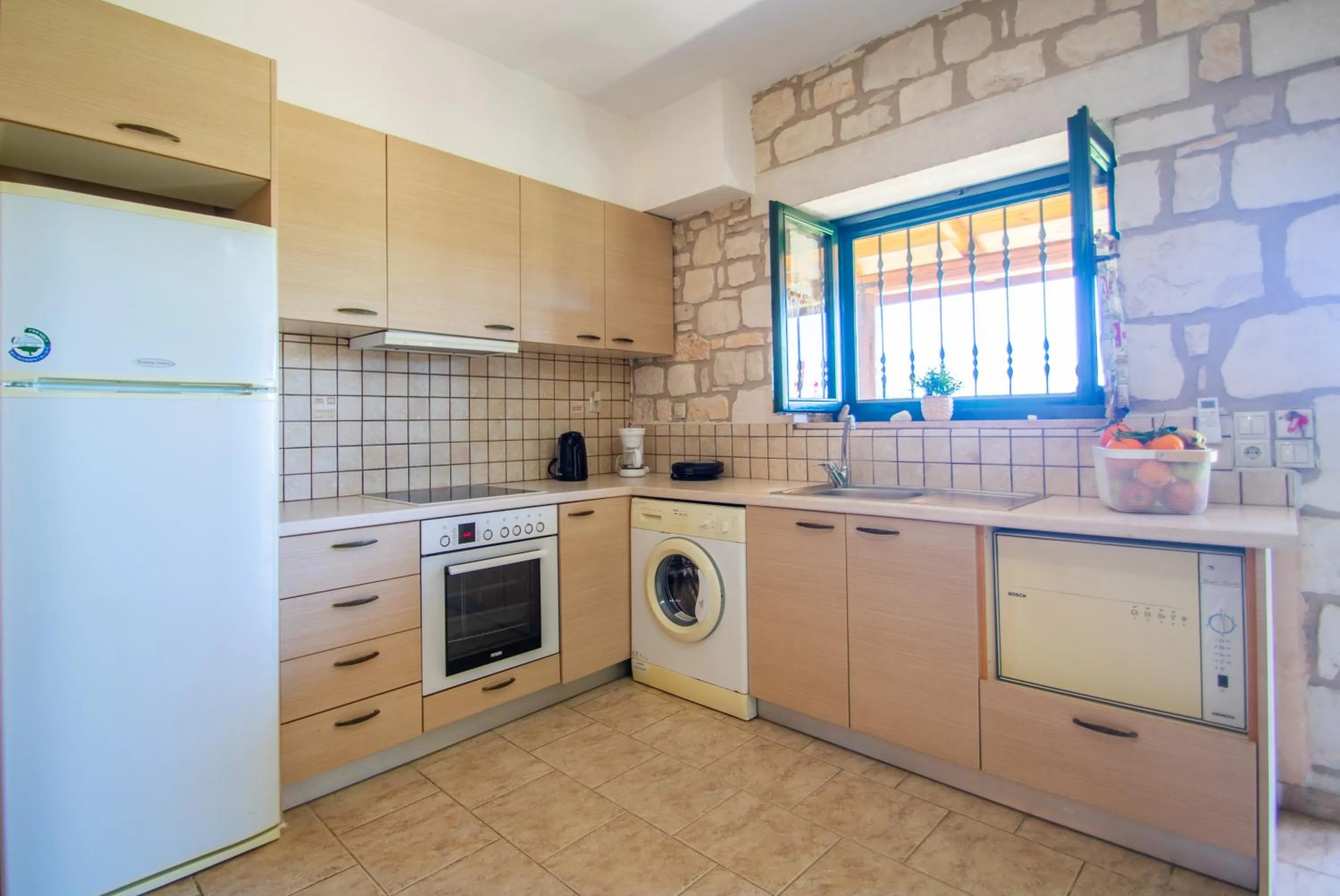 Kitchen or kitchenette in Ammos Zante Villas