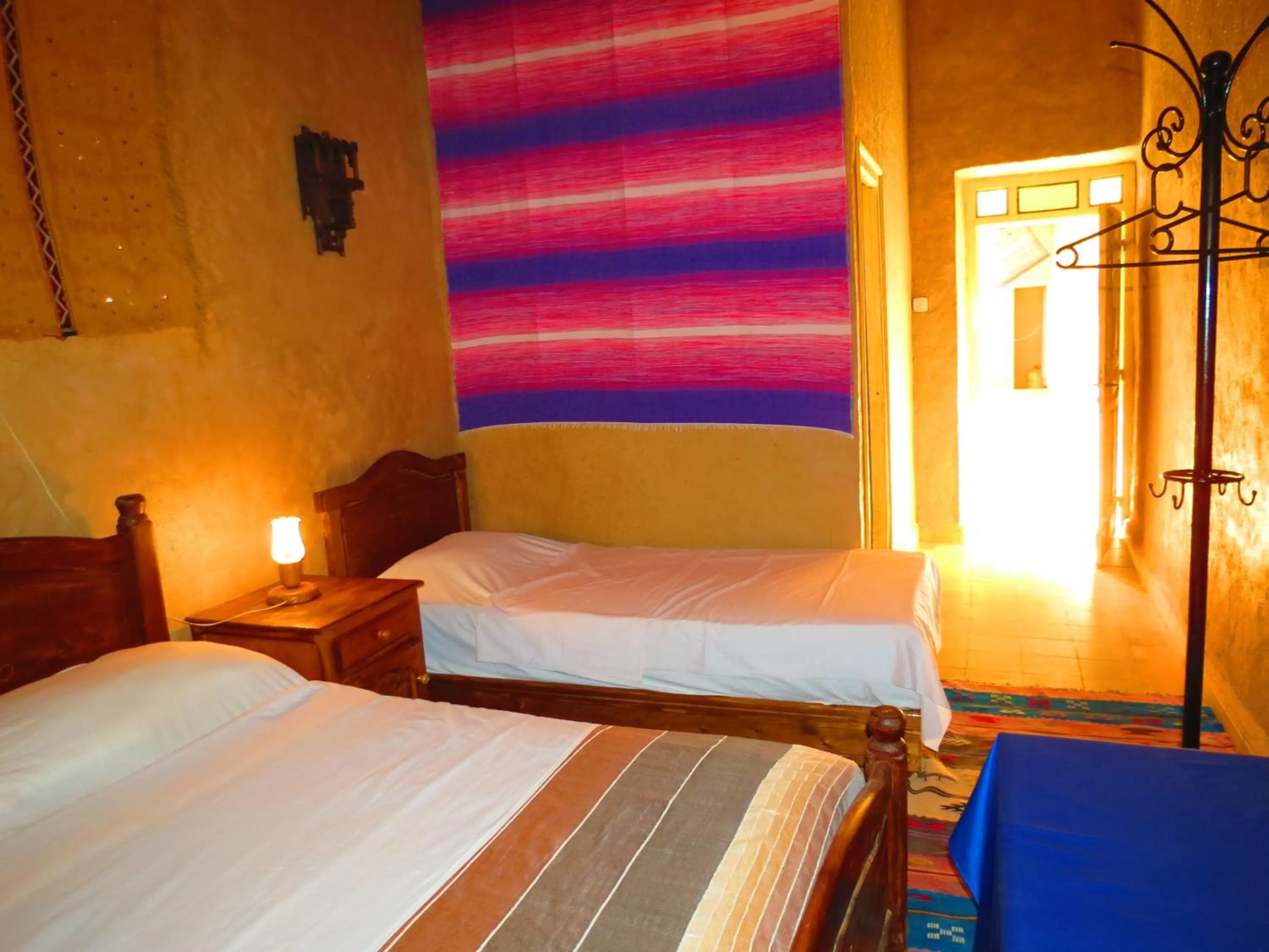 Bed in Hôtel Riad Tadarte Familier