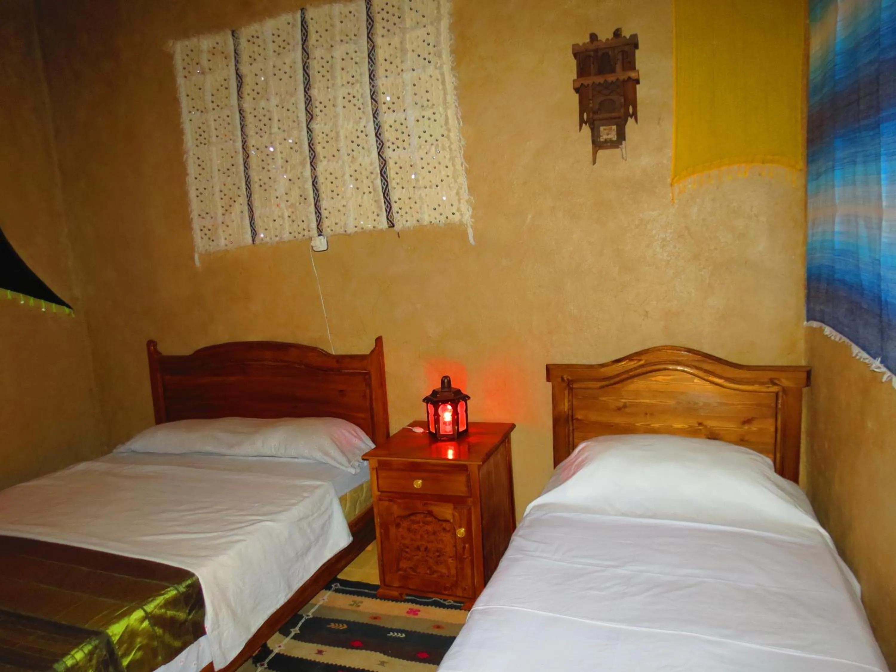 Bed in Hôtel Riad Tadarte Familier