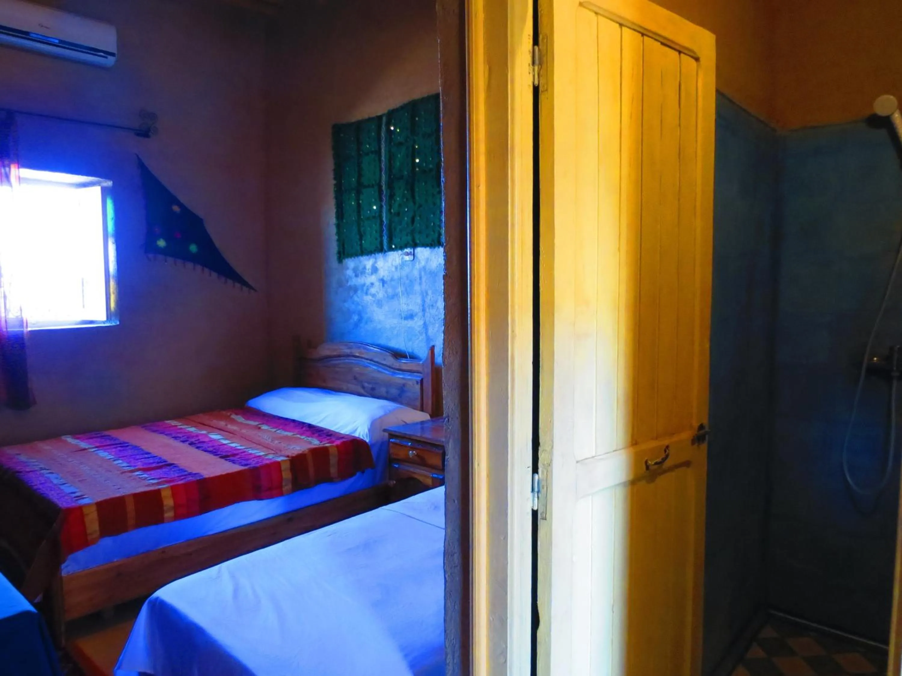 Bed in Hôtel Riad Tadarte Familier