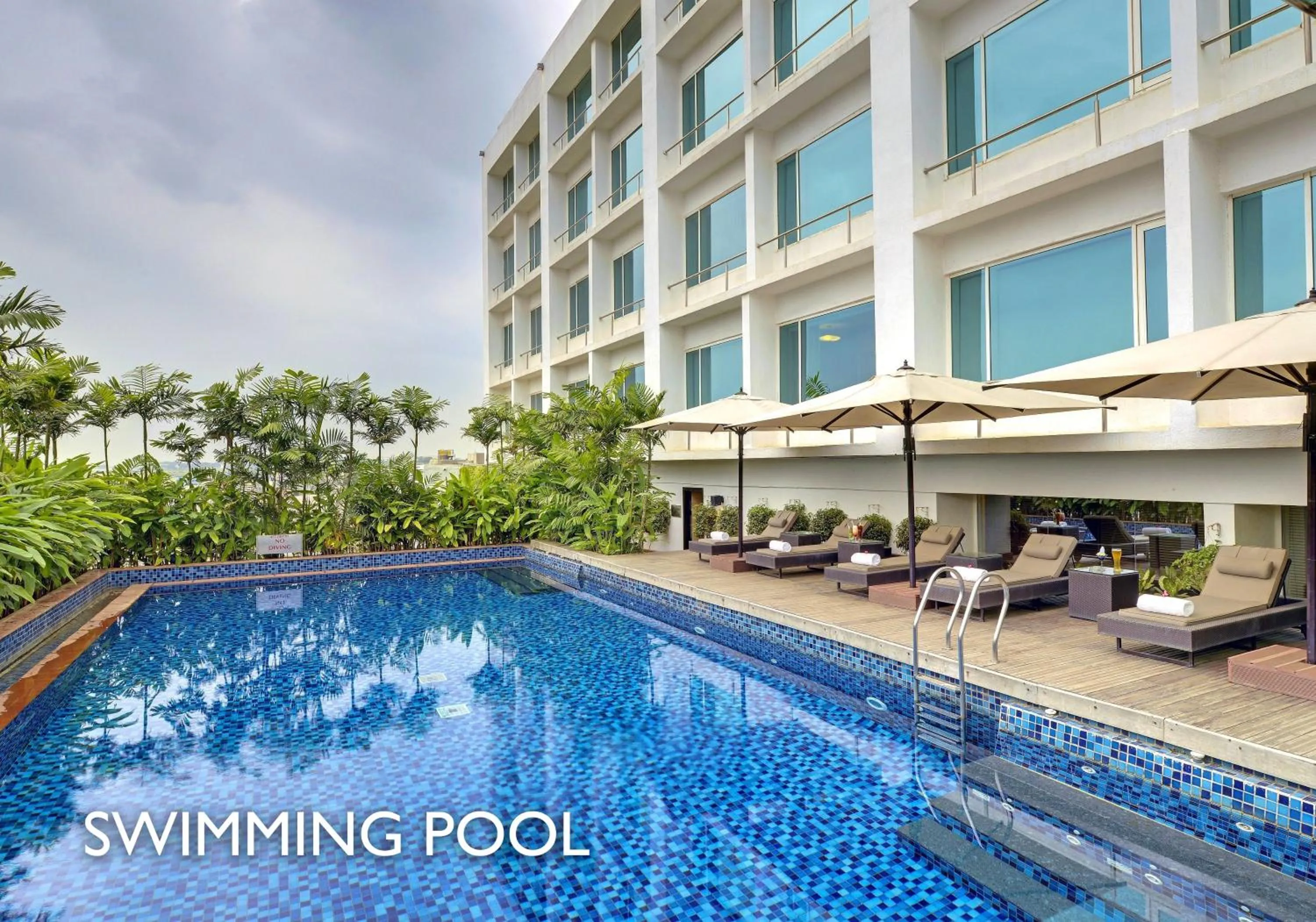 Swimming pool in Radisson Blu Bengaluru Outer Ring Road