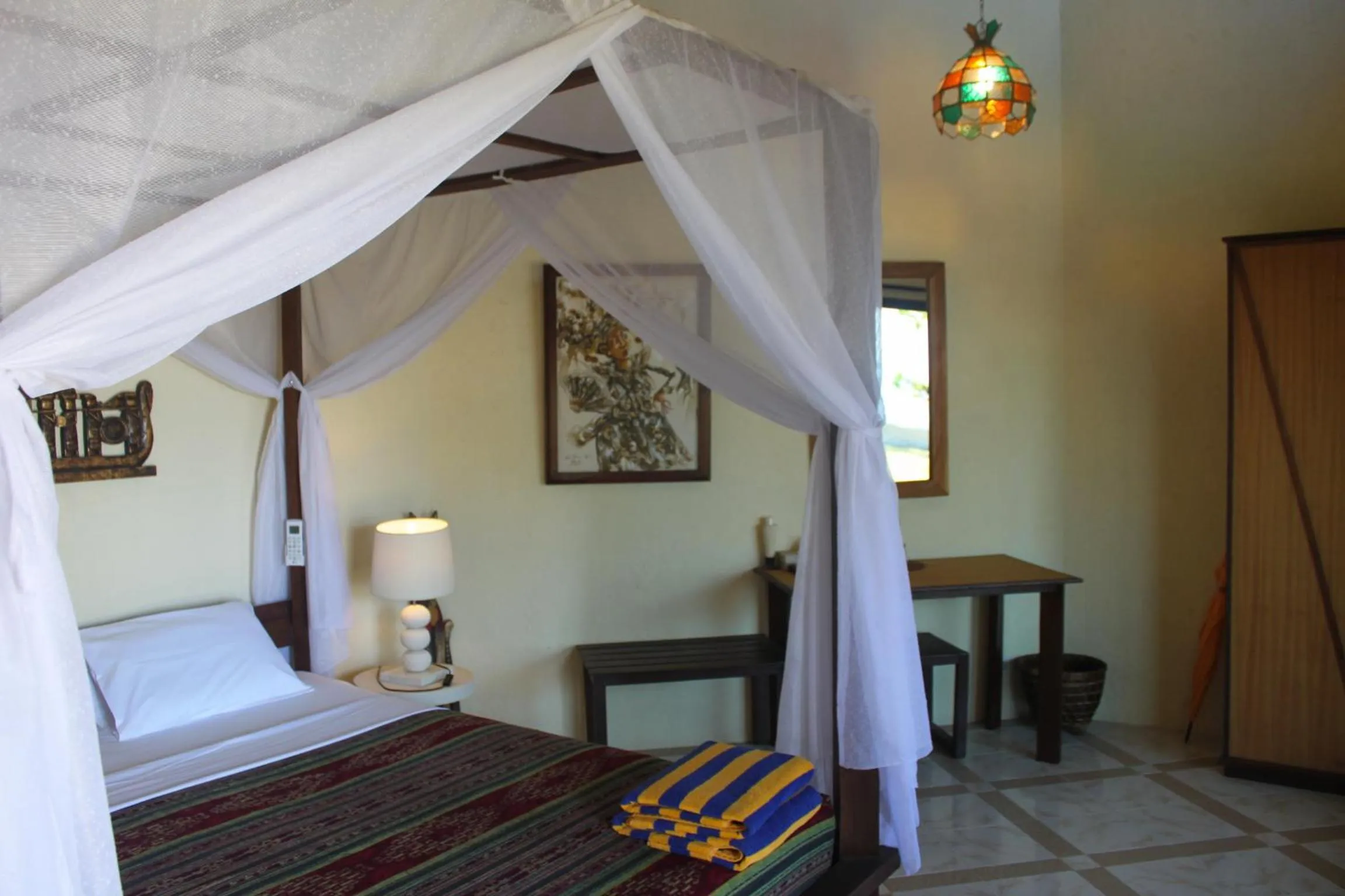 Bed in Hotel Uyah Amed Spa Resort