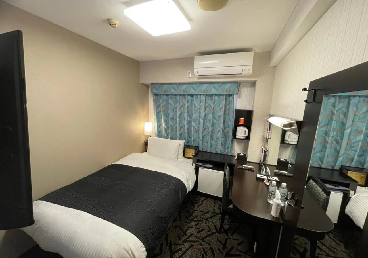 Bed in APA Hotel Ishigakijima