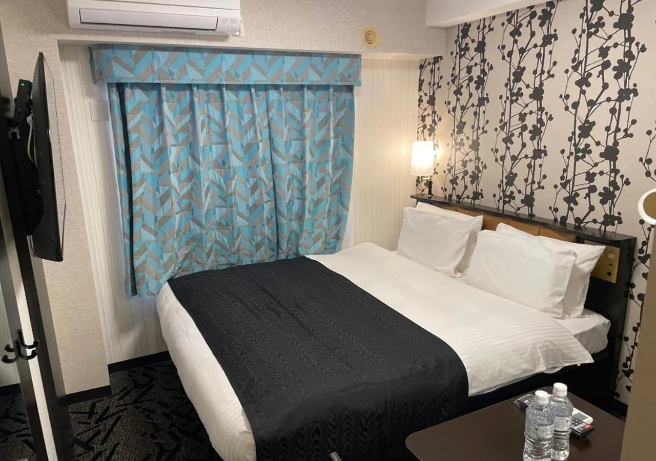 Bed in APA Hotel Ishigakijima