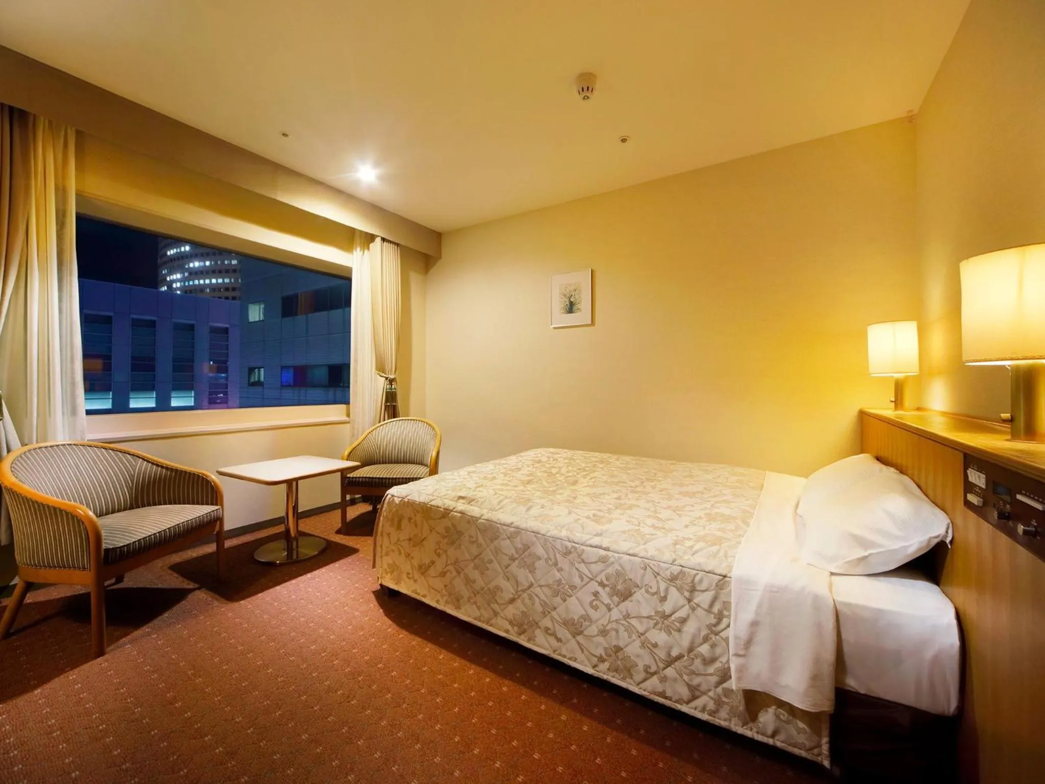 Bed in Hotel Crown Palais Hamamatsu