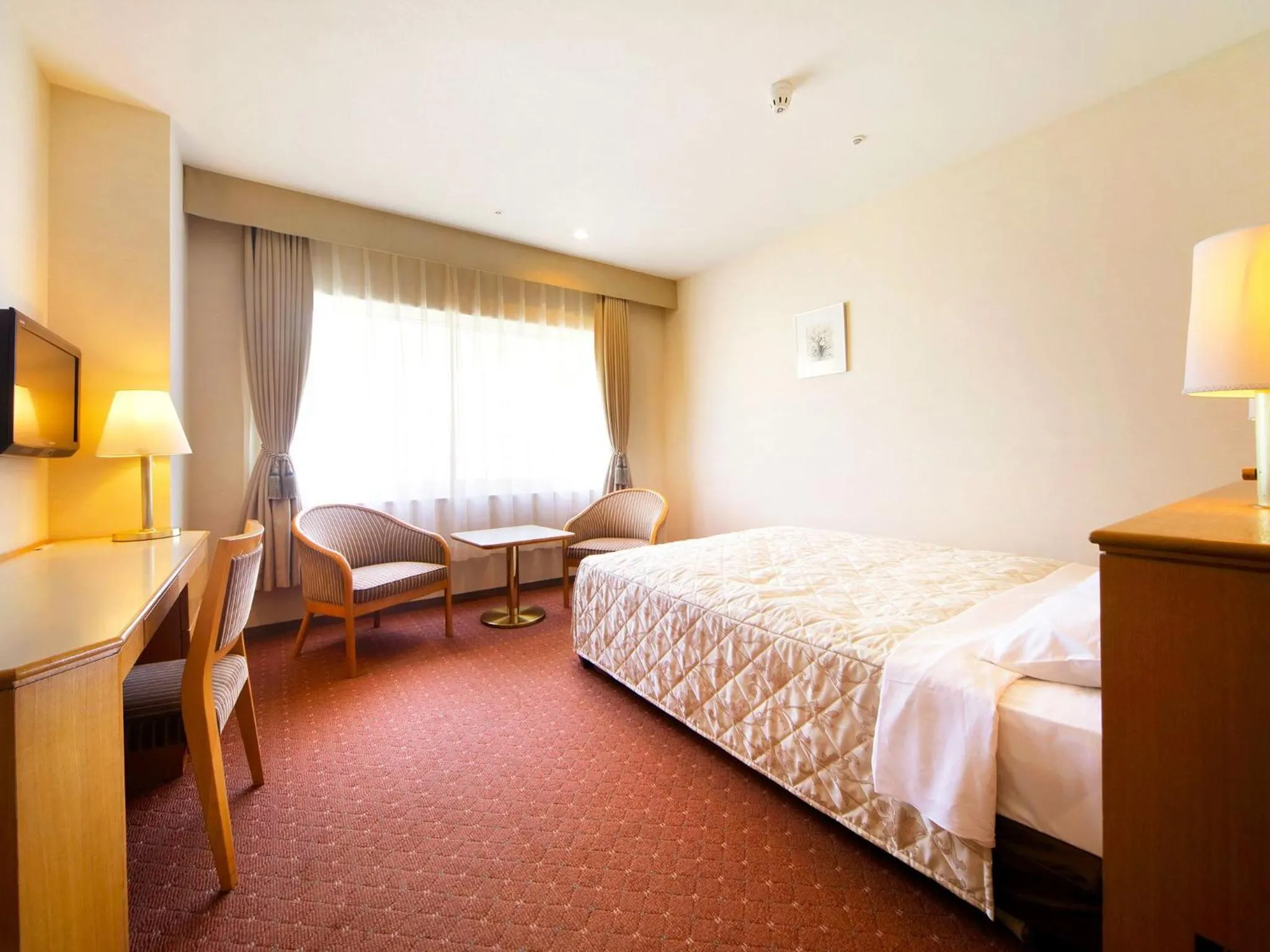 Bed in Hotel Crown Palais Hamamatsu