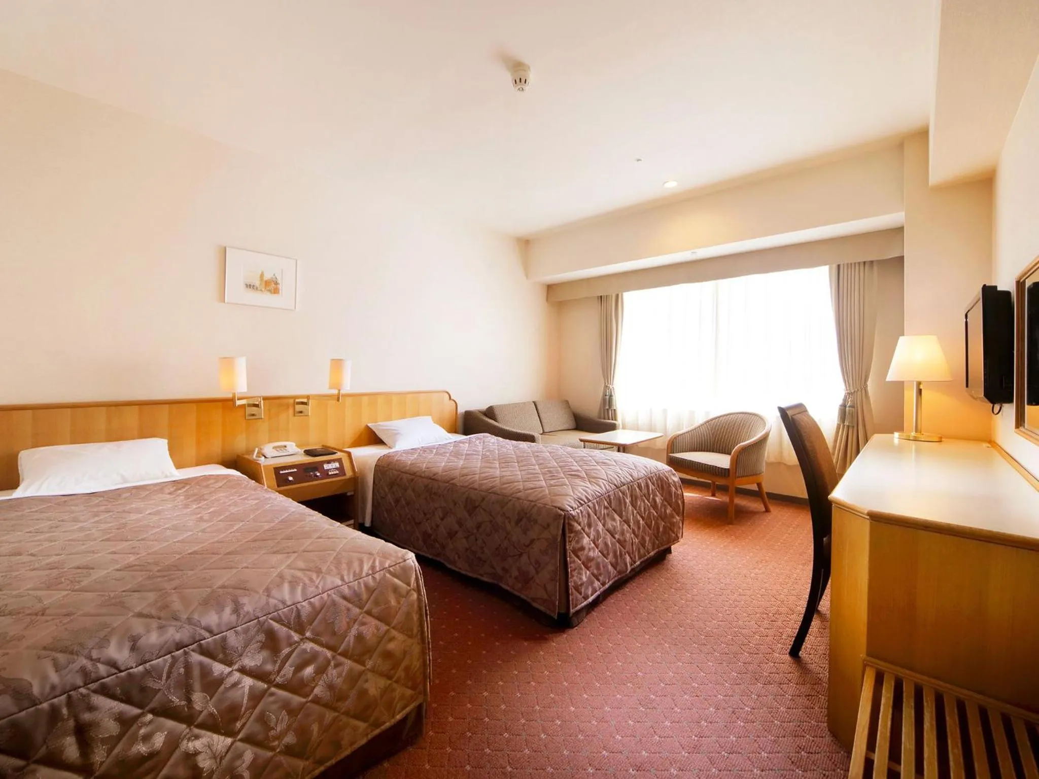 Bed in Hotel Crown Palais Hamamatsu