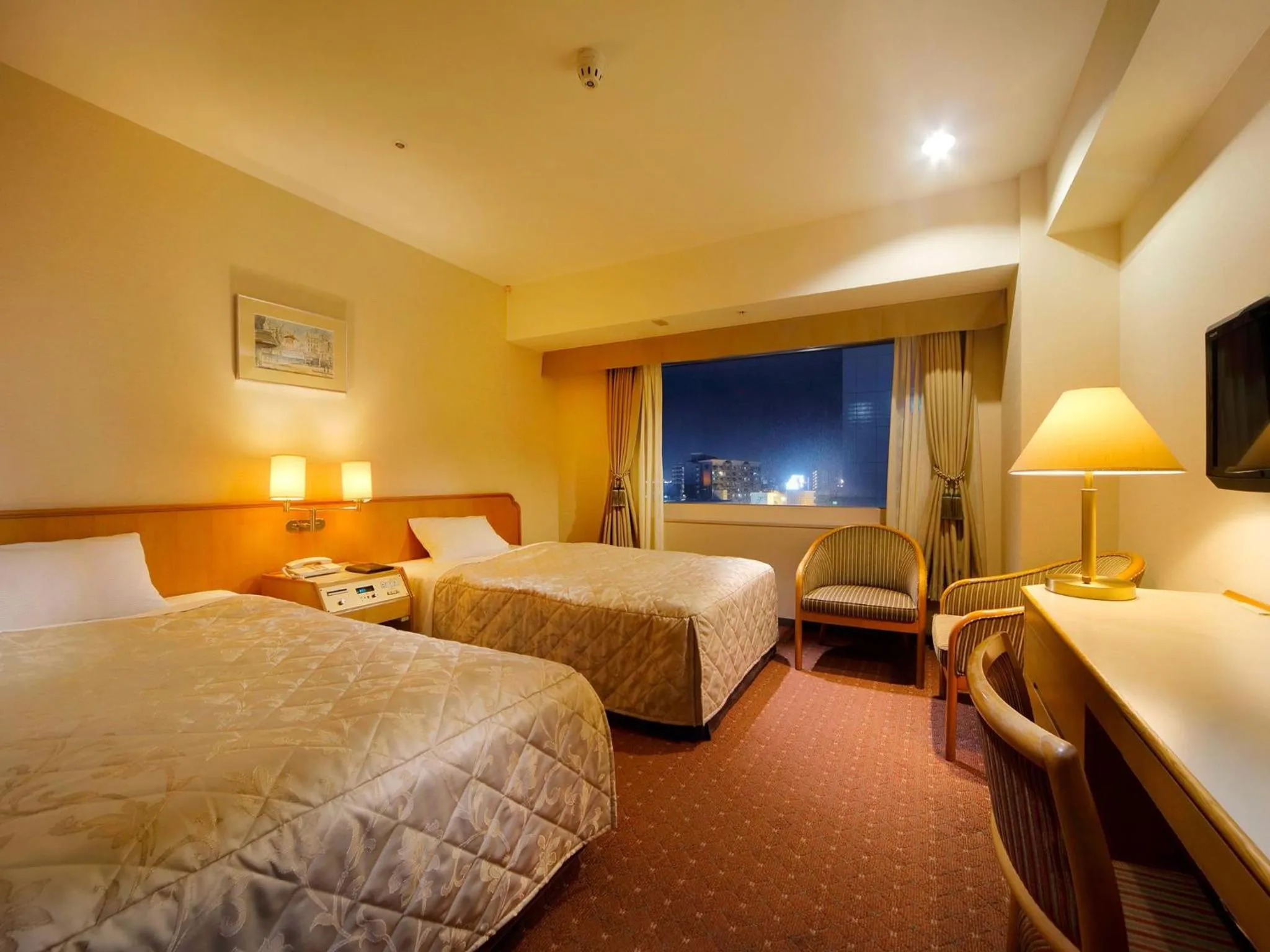 Bed in Hotel Crown Palais Hamamatsu