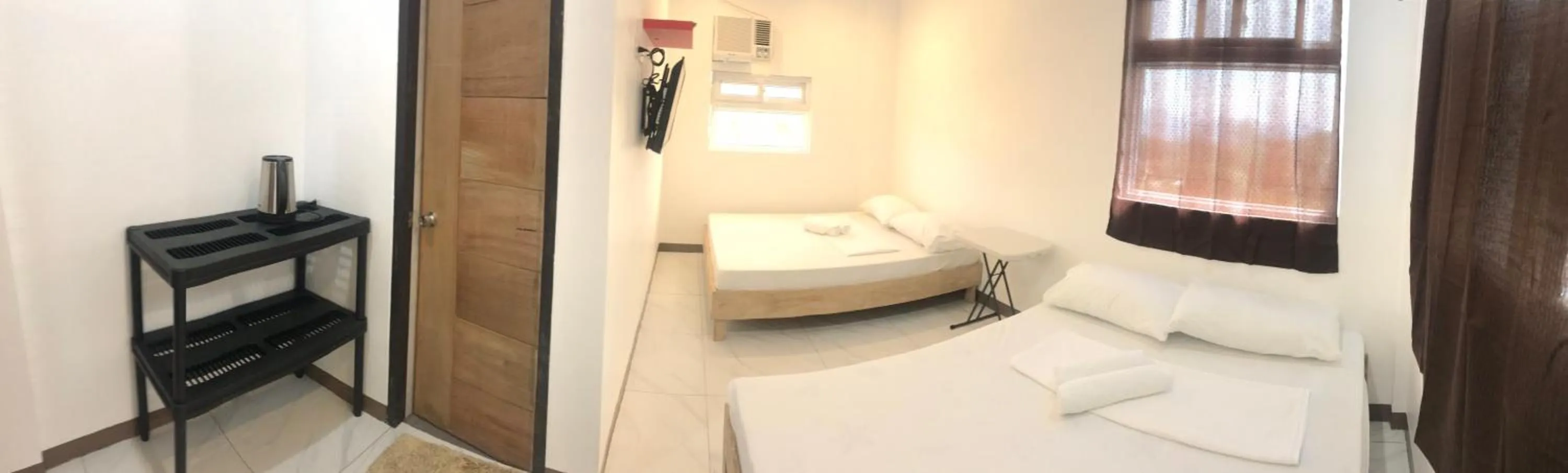 Bed in Seabreeze Beach Lodge