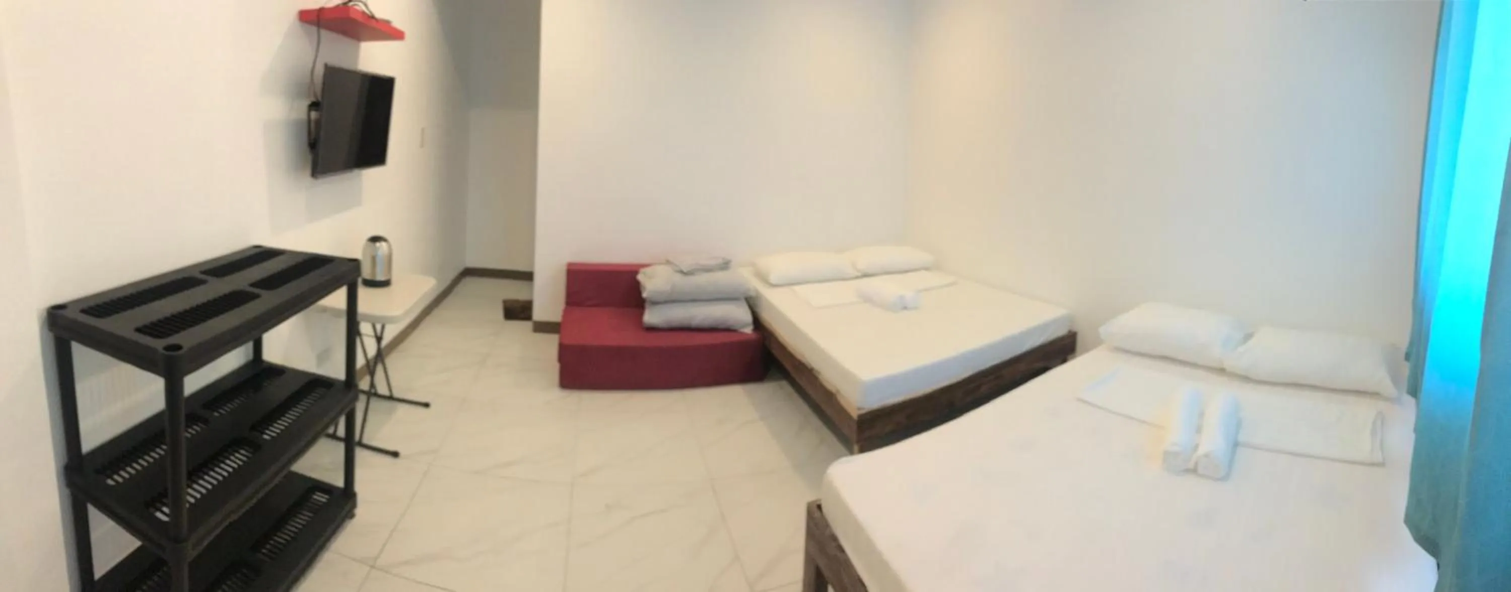 Bed in Seabreeze Beach Lodge