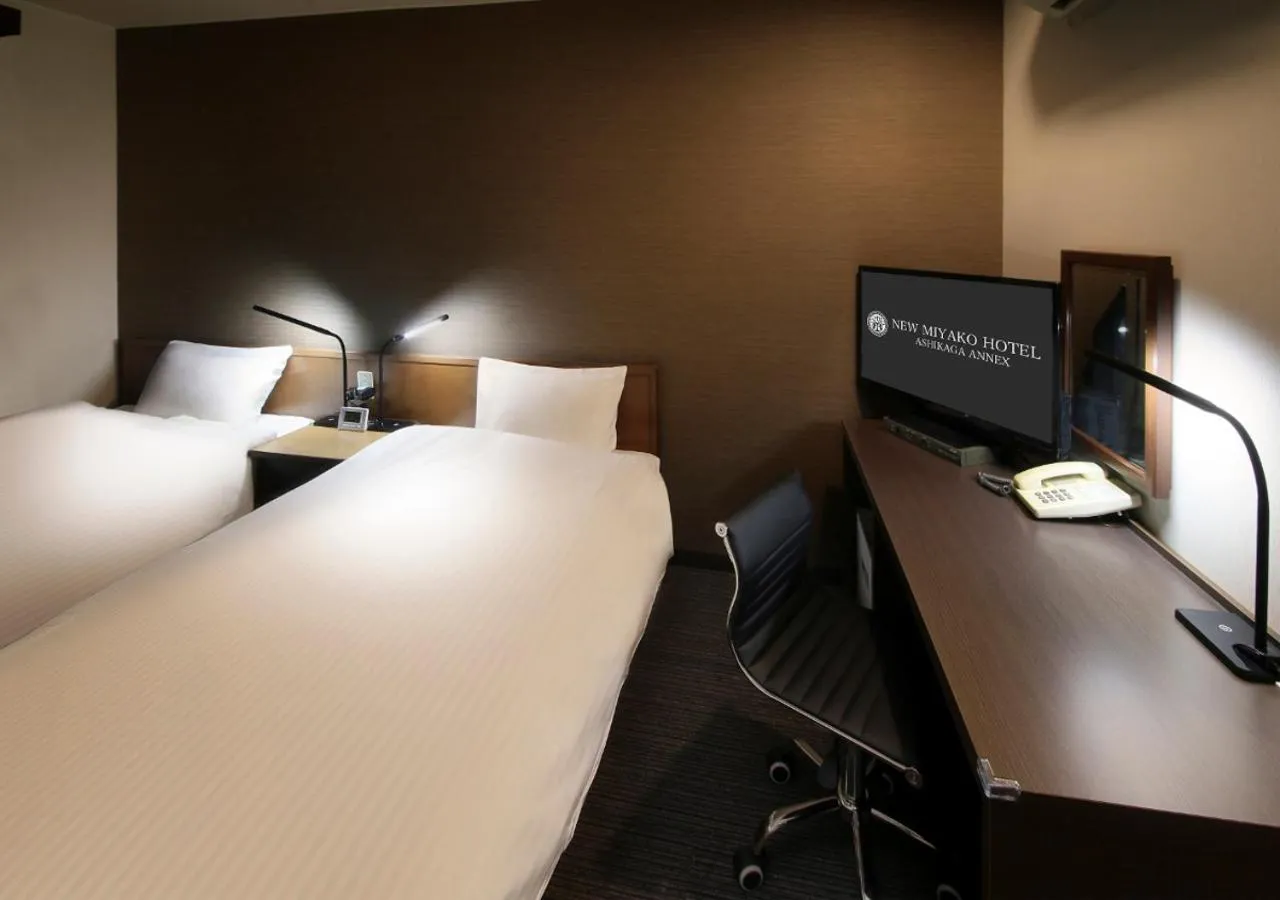 Bed in New Miyako Hotel Ashikaga Annex