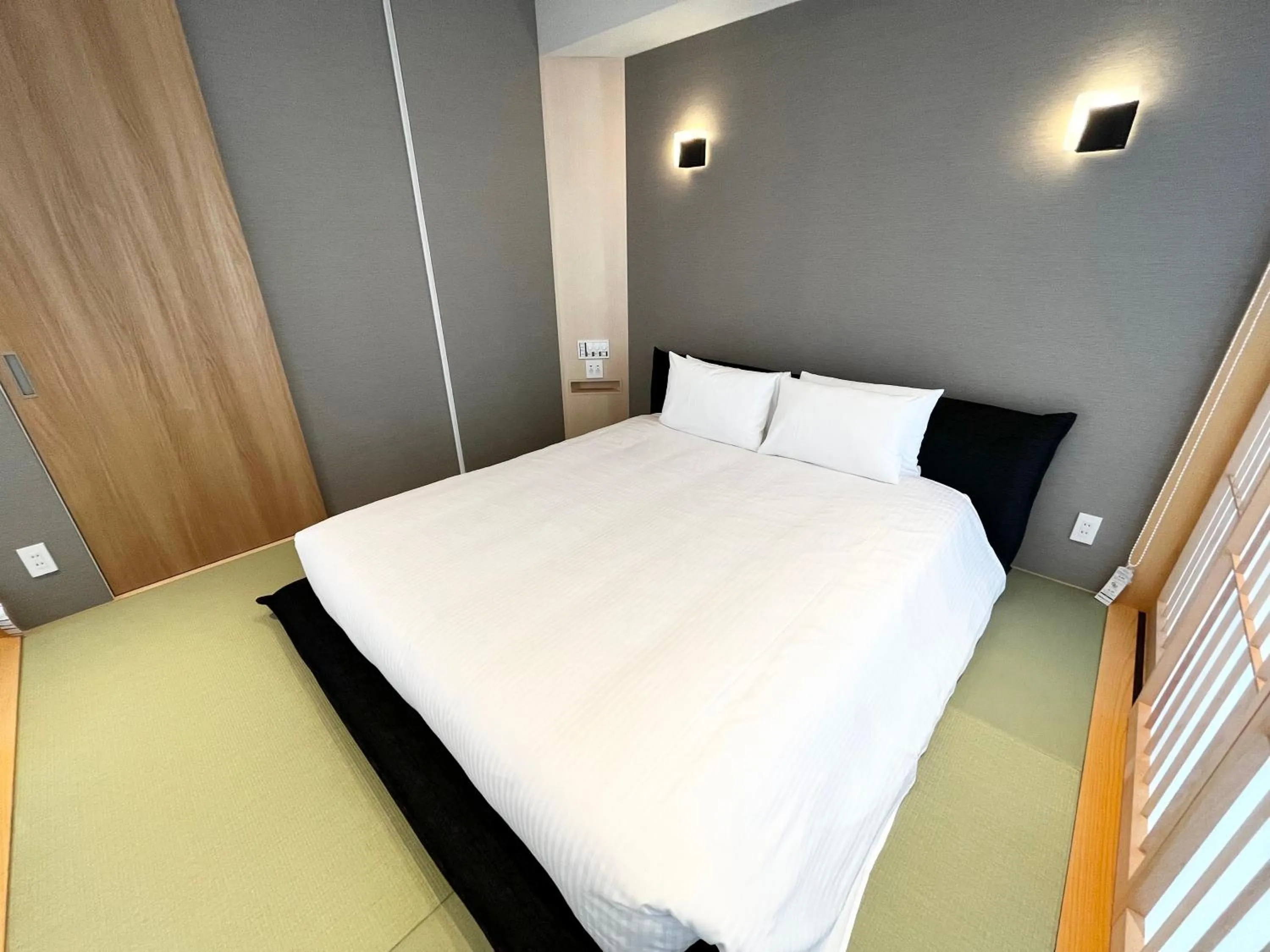 Bed in PORTA INN bentencho