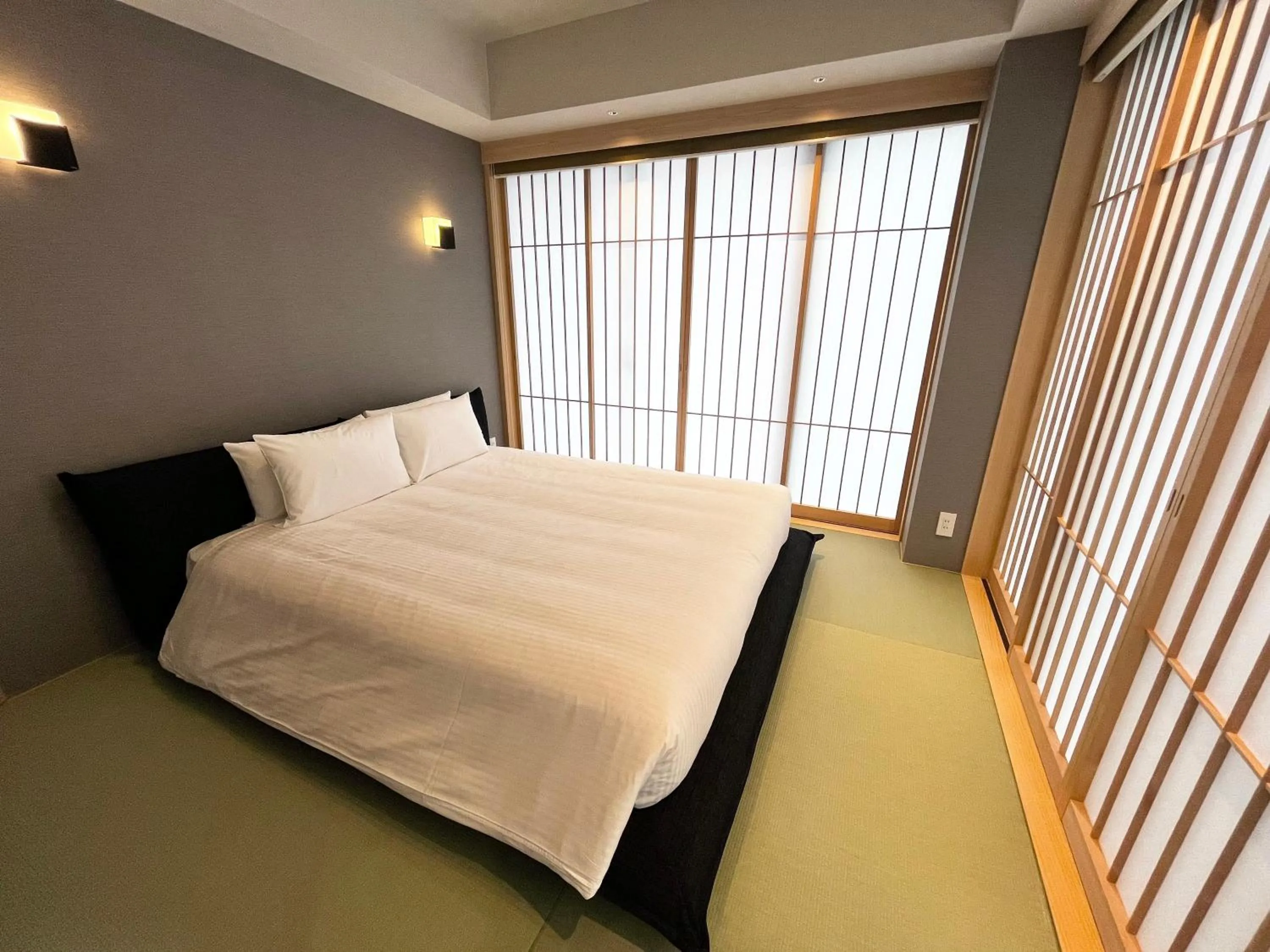 Bed in PORTA INN bentencho
