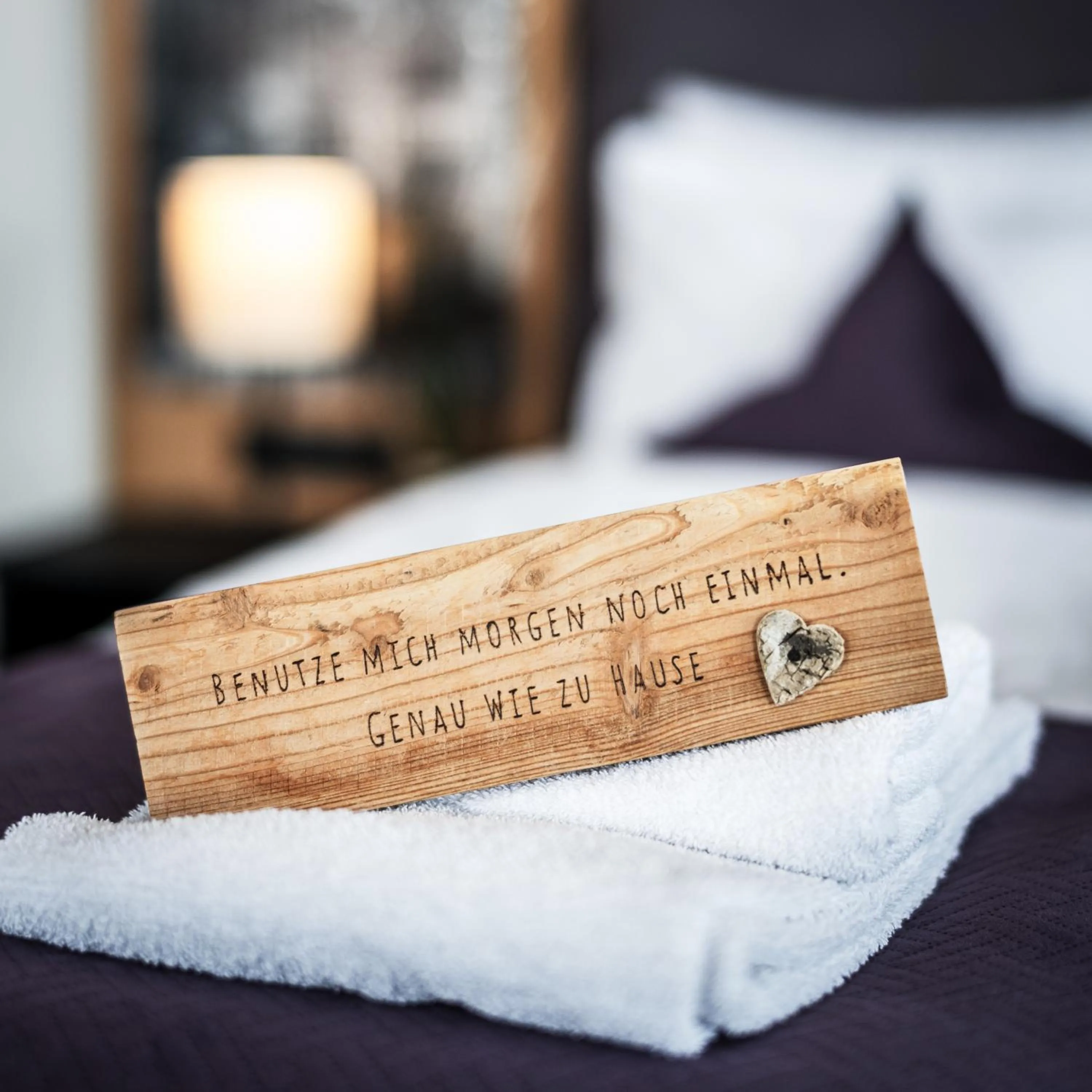 Bed in Arthur's Hotel und Apartments am Achensee