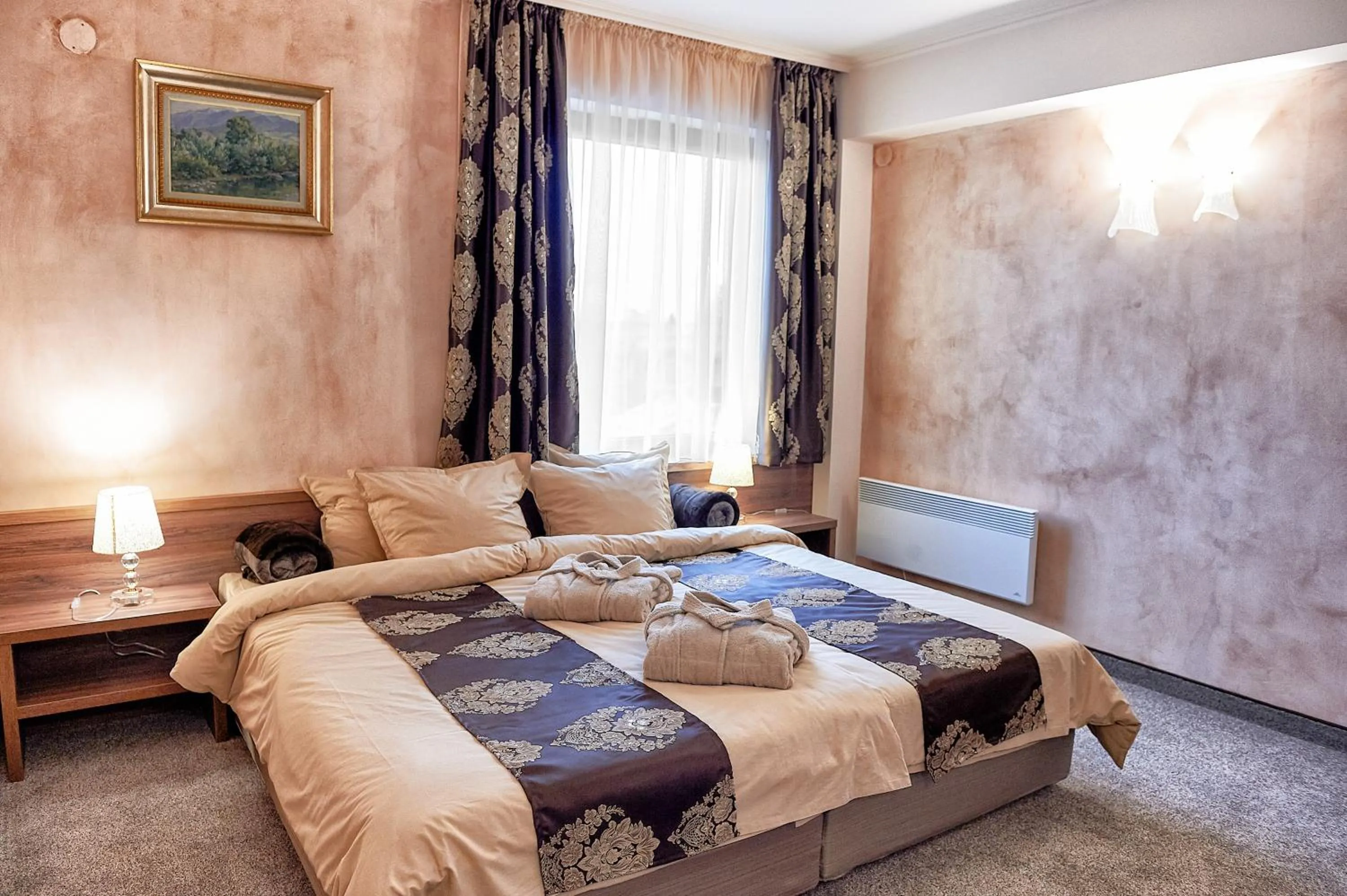 Bed in Platinum Image Hotel