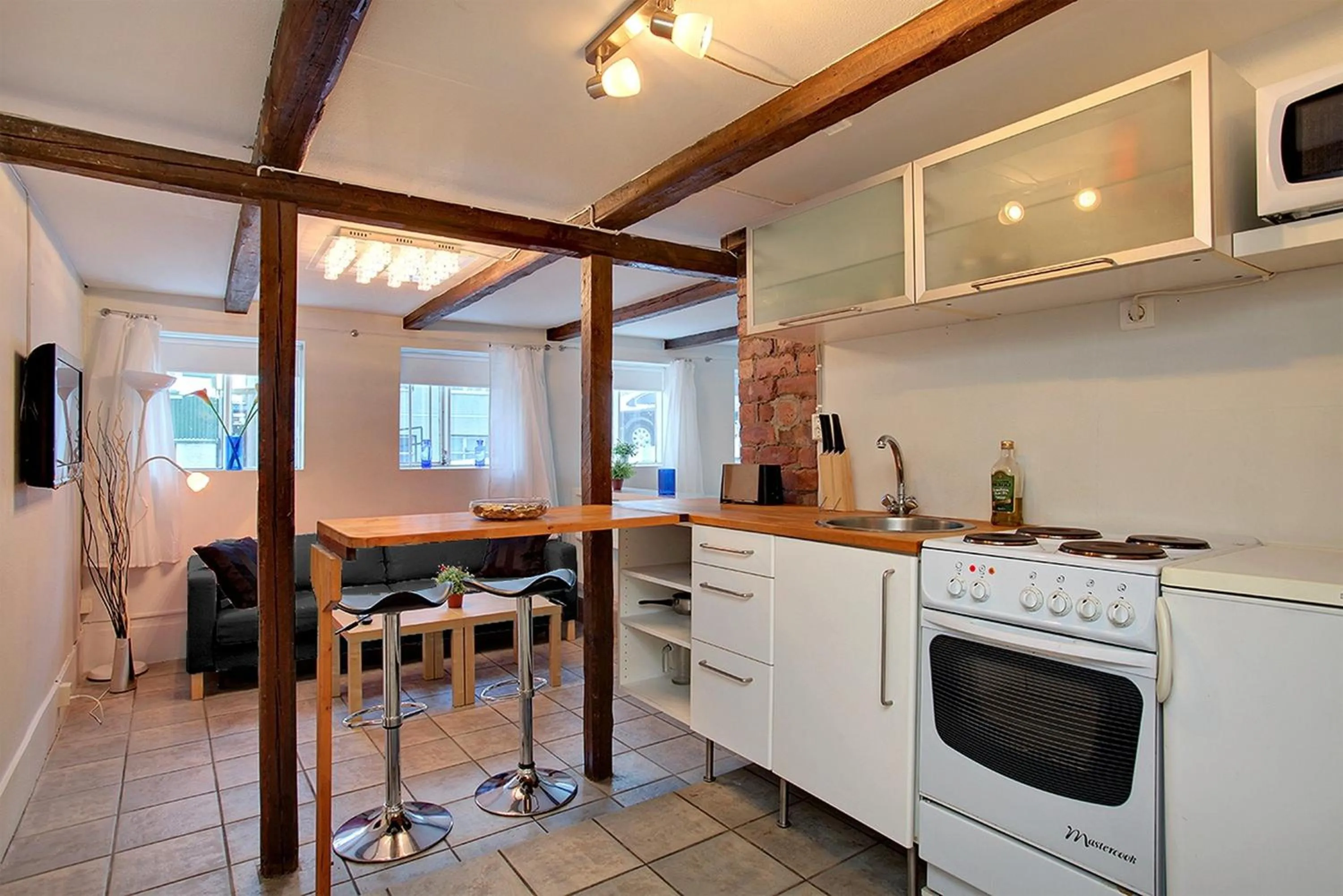 Kitchen or kitchenette in Alfred's Apartments