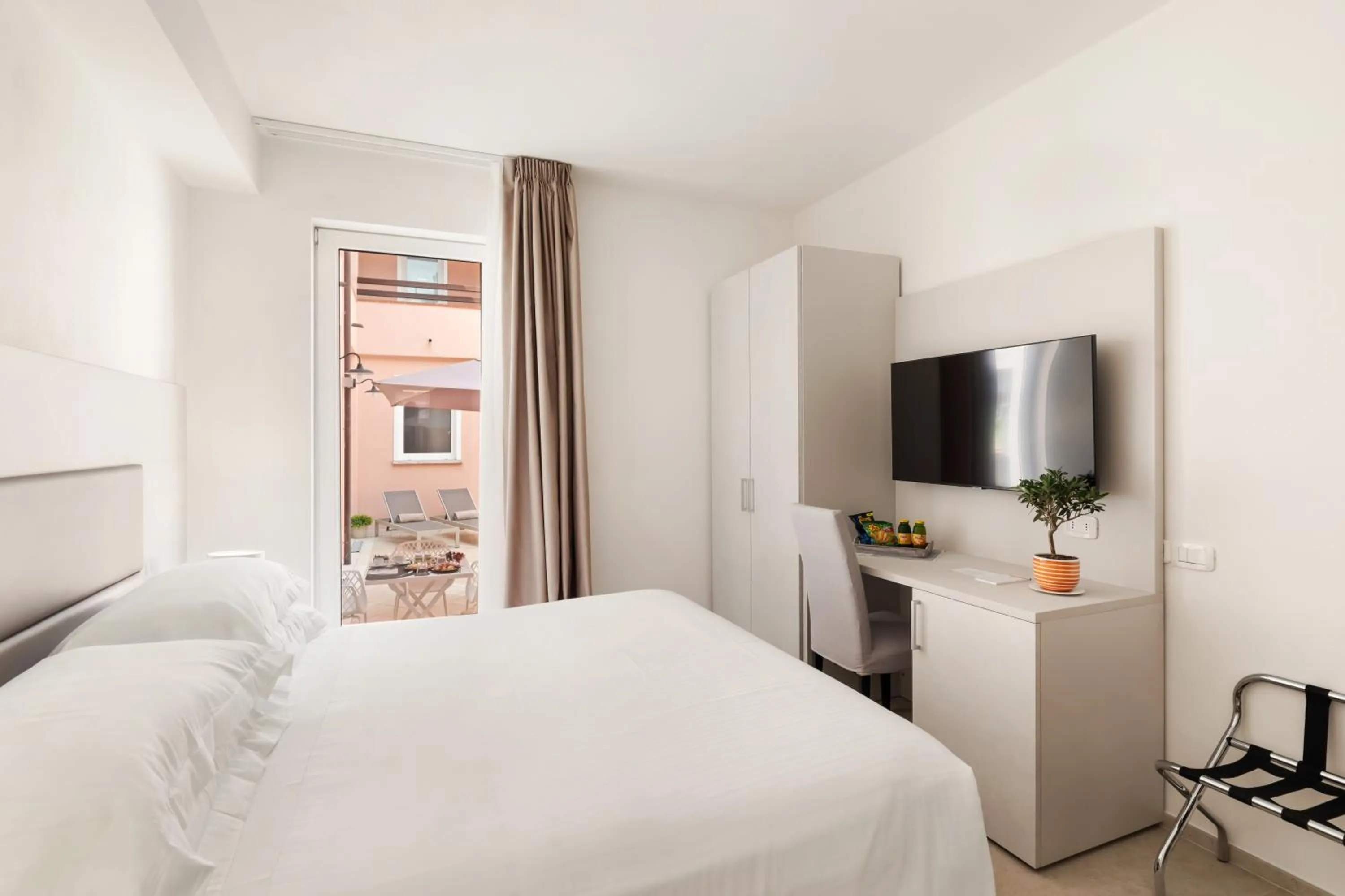 Bedroom in Hotel Villa Domizia