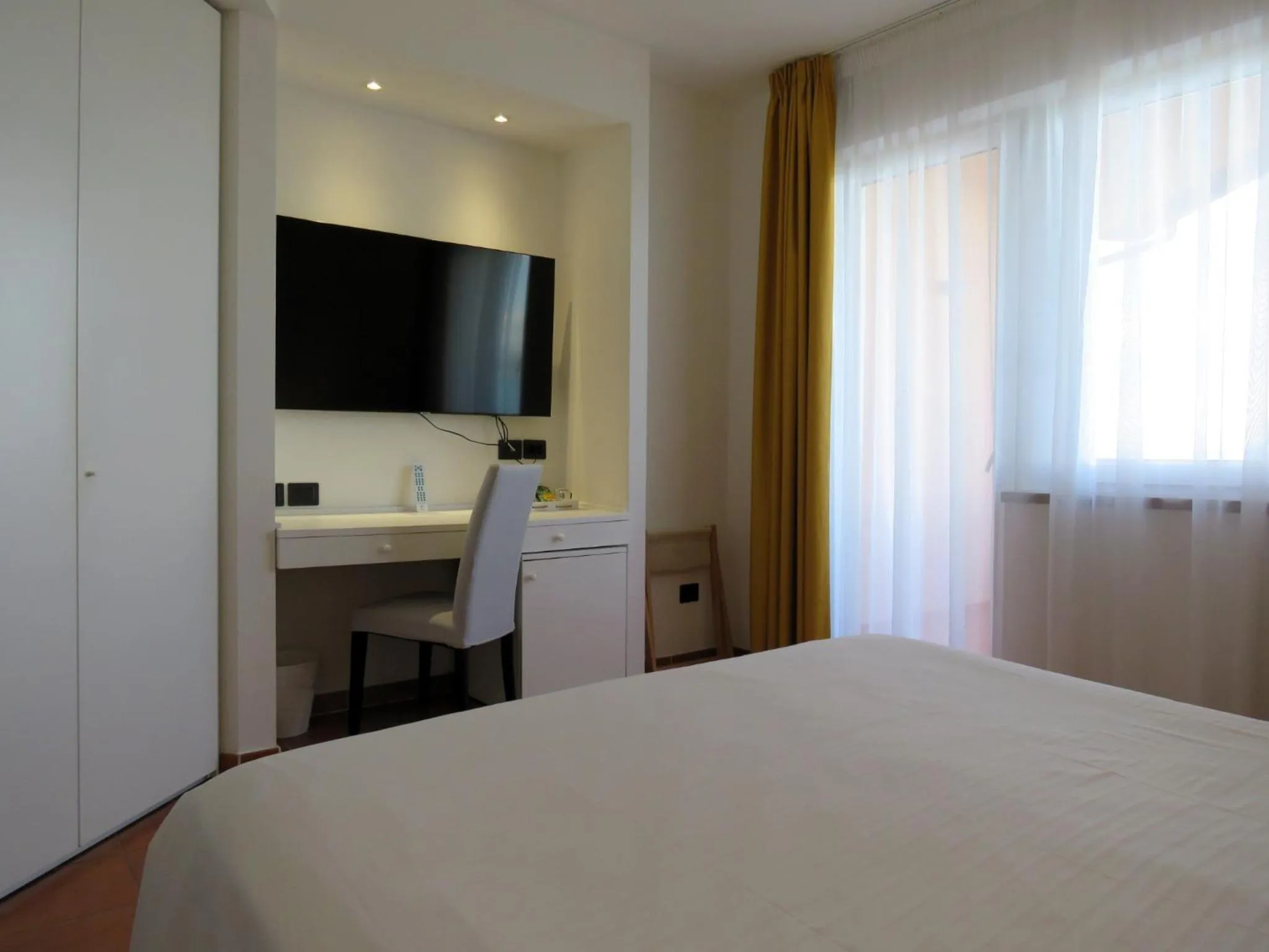 Bedroom in Hotel Villa Domizia