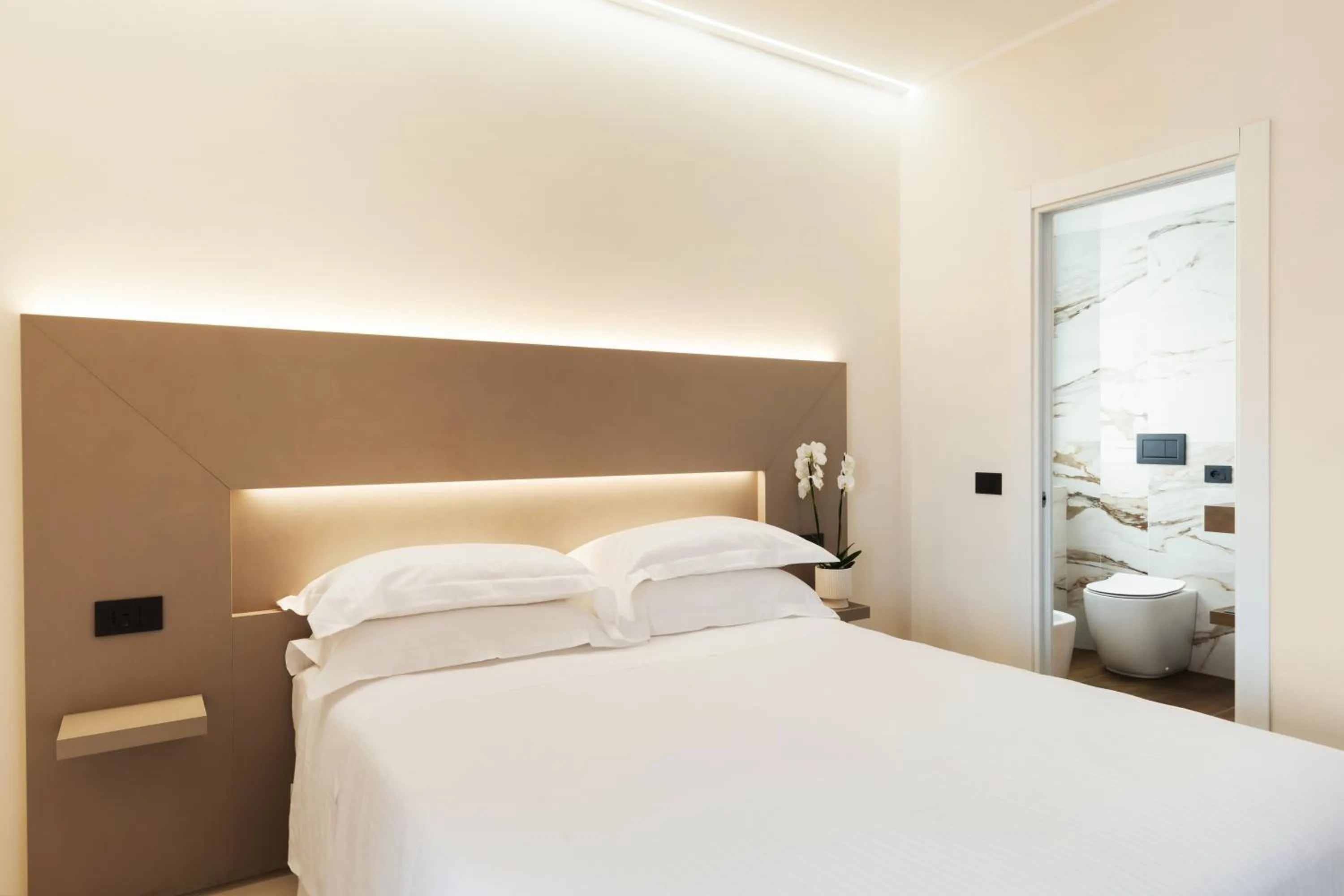 Bedroom in Hotel Villa Domizia